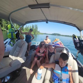 a cocktail glass with a cherry