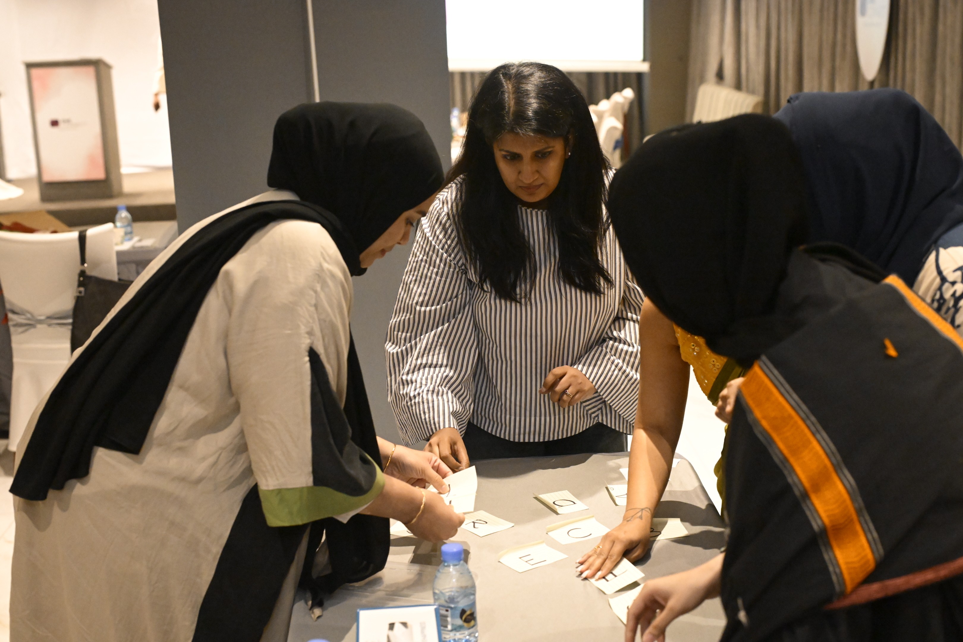 Close-up of a tree stump showing growth rings and a textured brown wood surface.