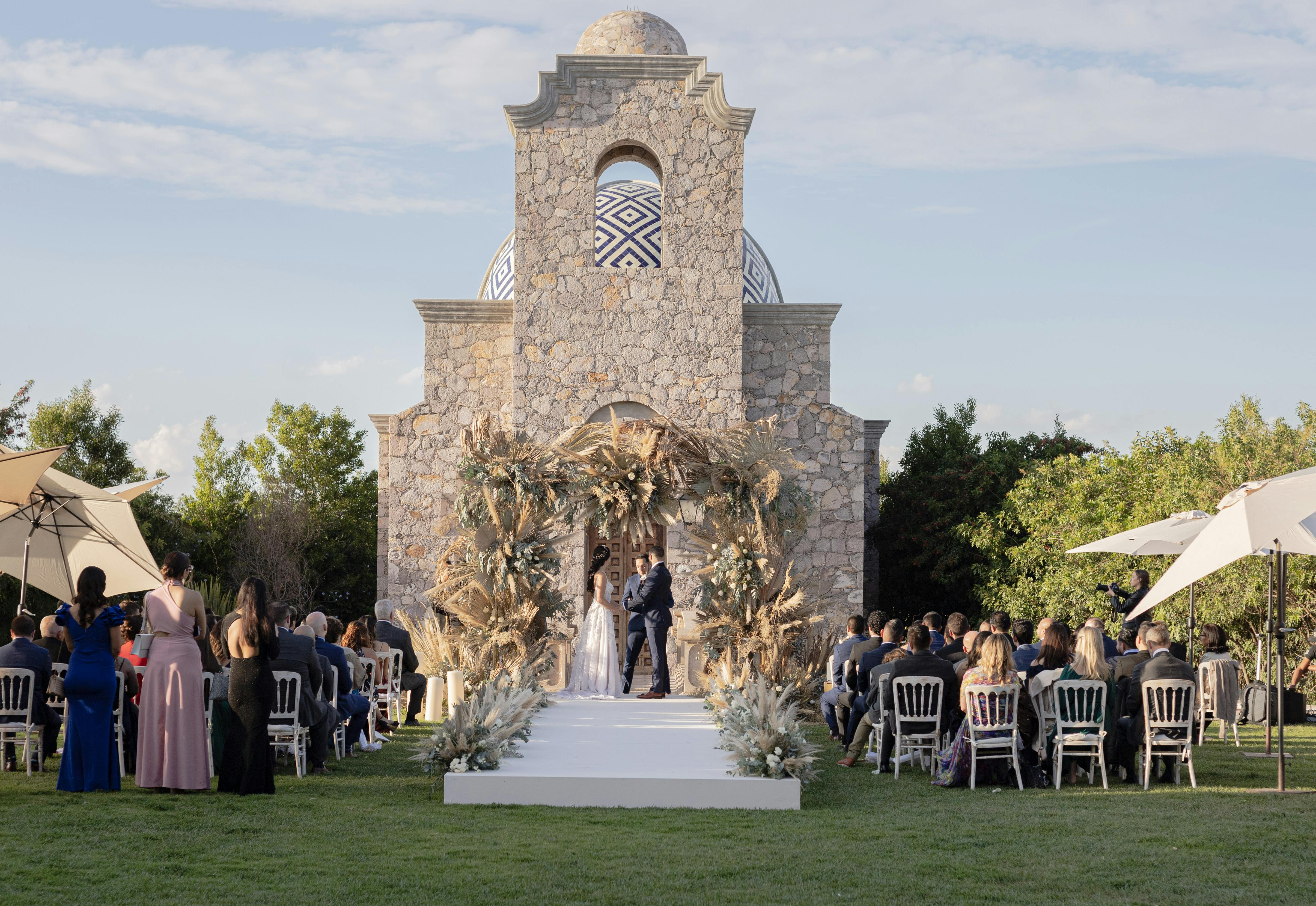 A bride and groom embracing on a boat