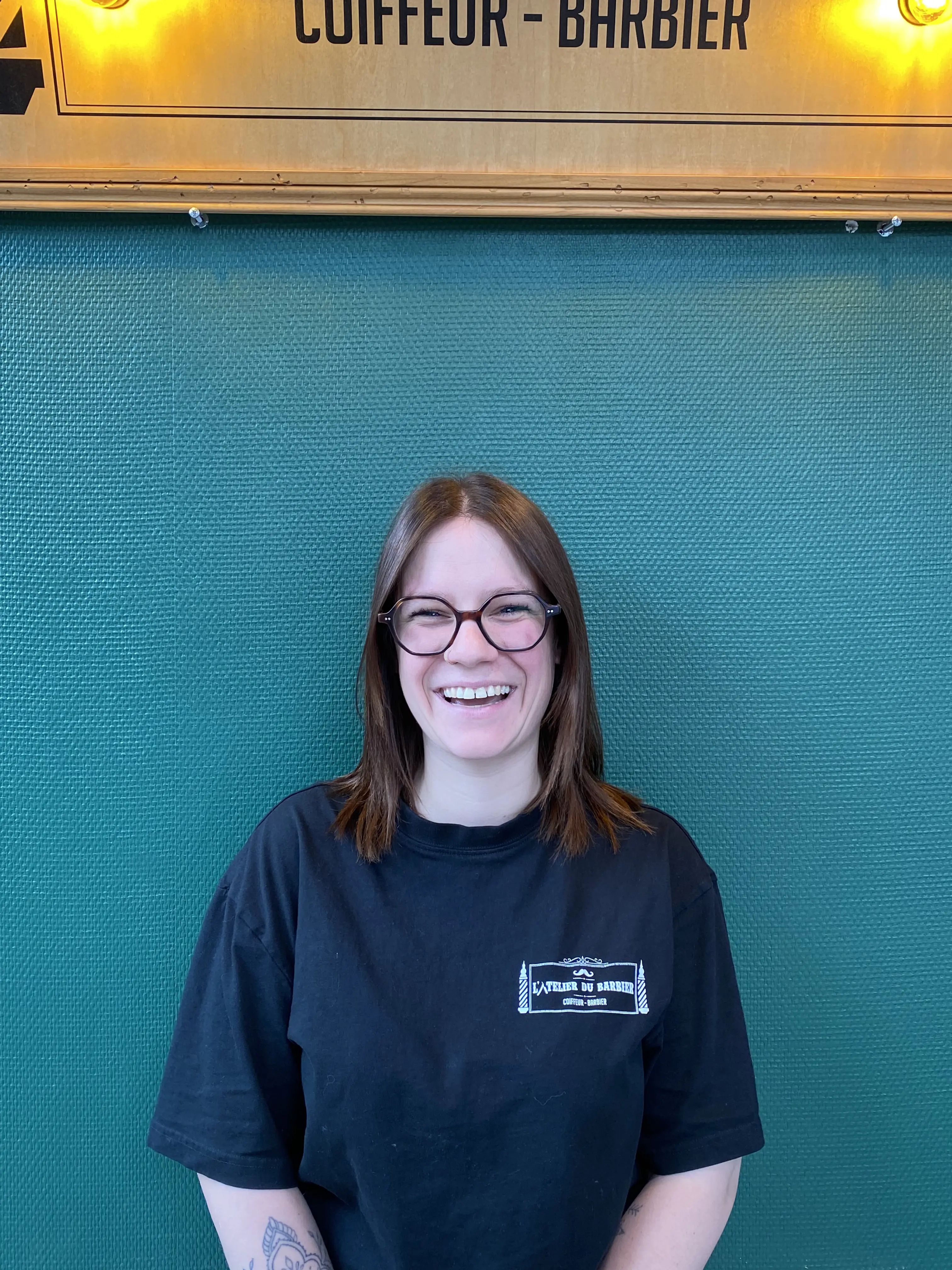 black haired man making face