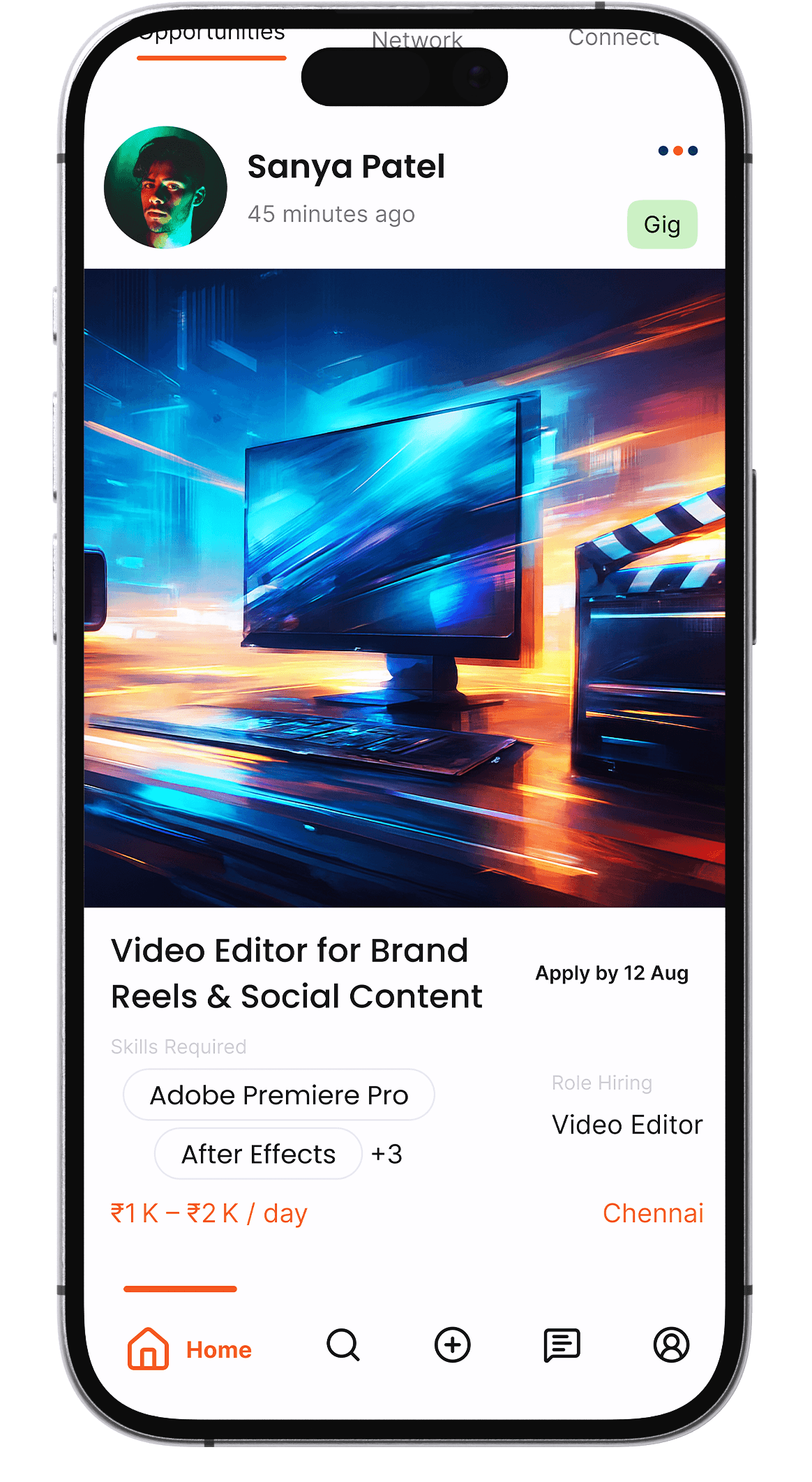 Aerial view of a winding road cutting through rocky terrain with patches of grass.