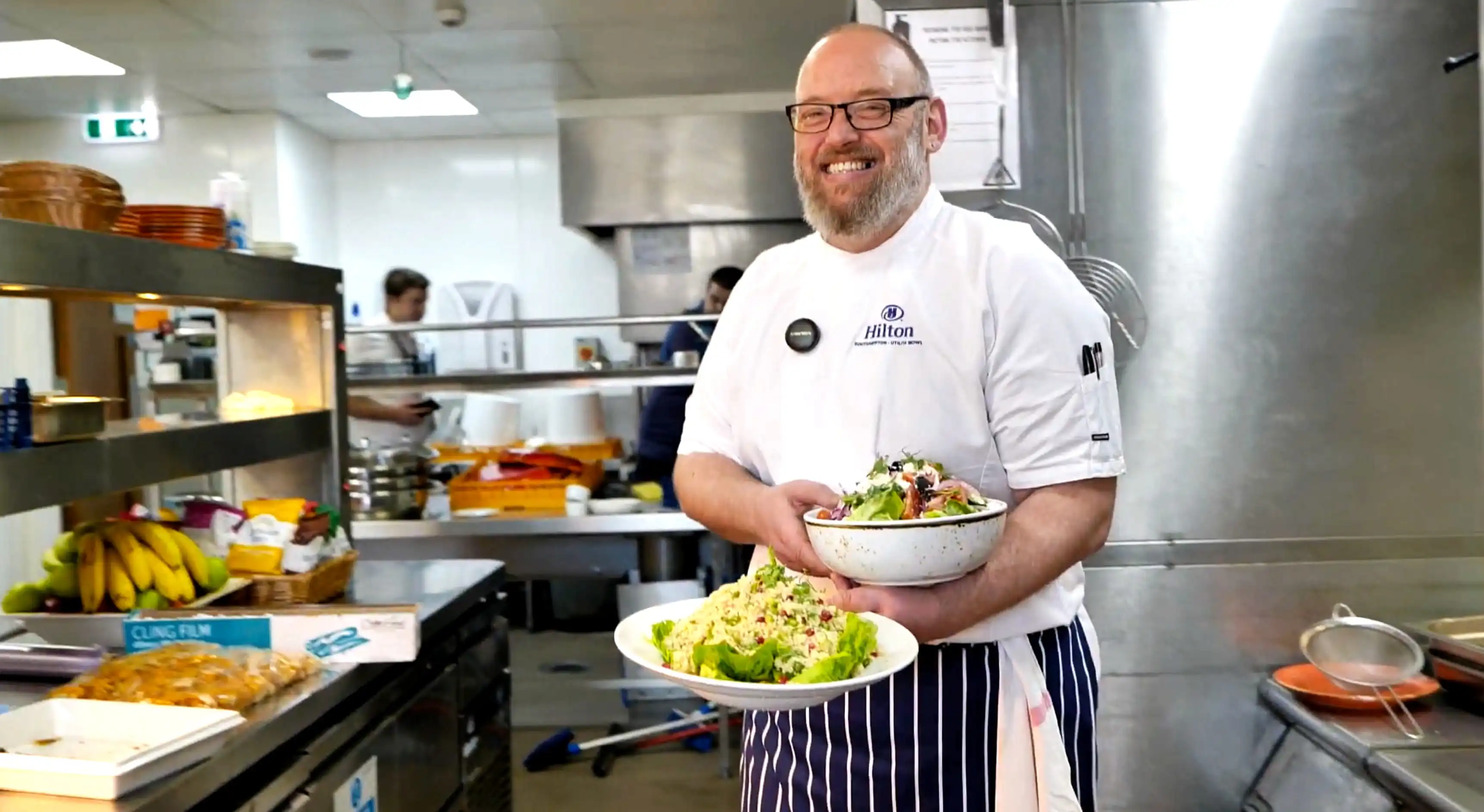 Chef Jamie holding food