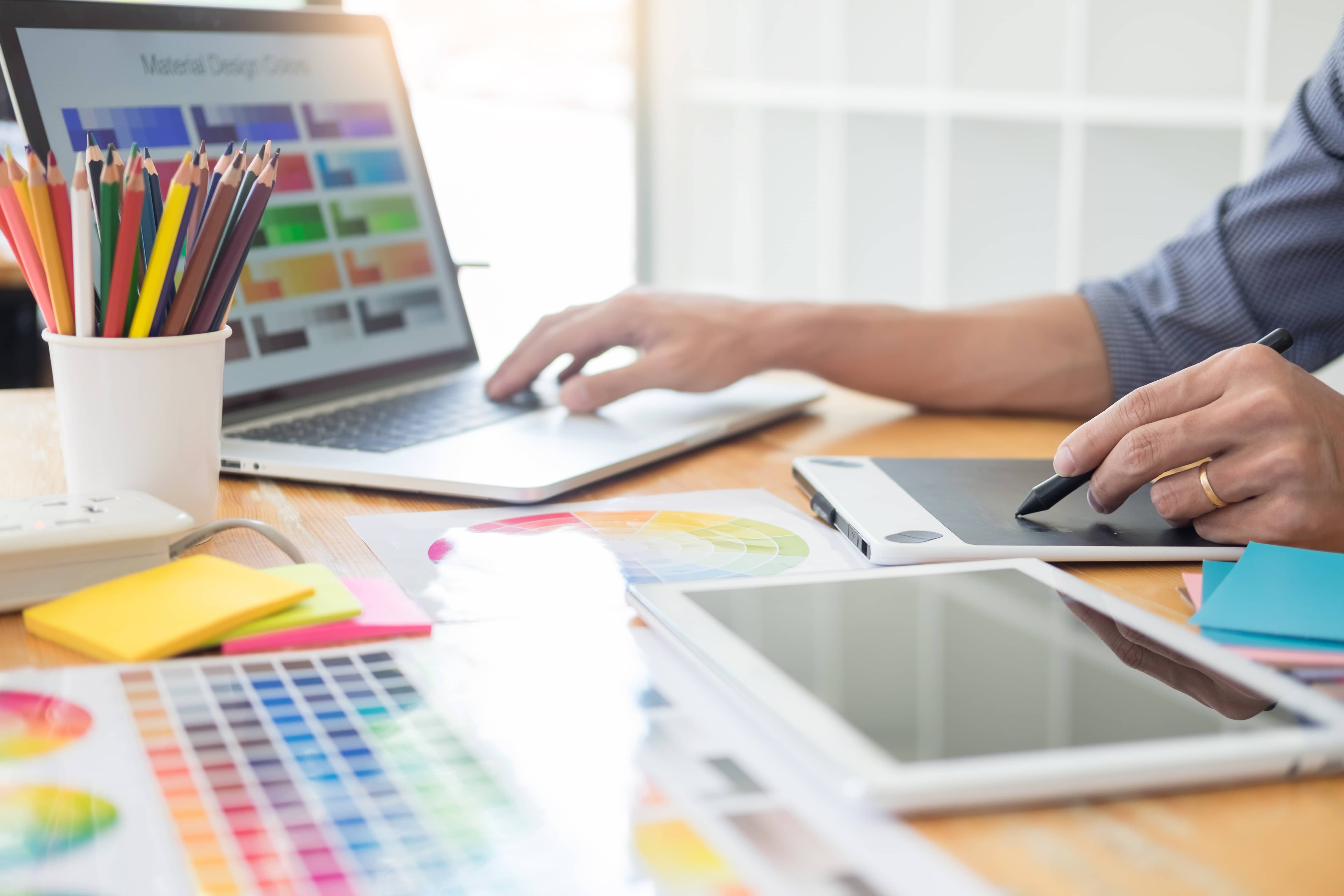 Person planning colors for website