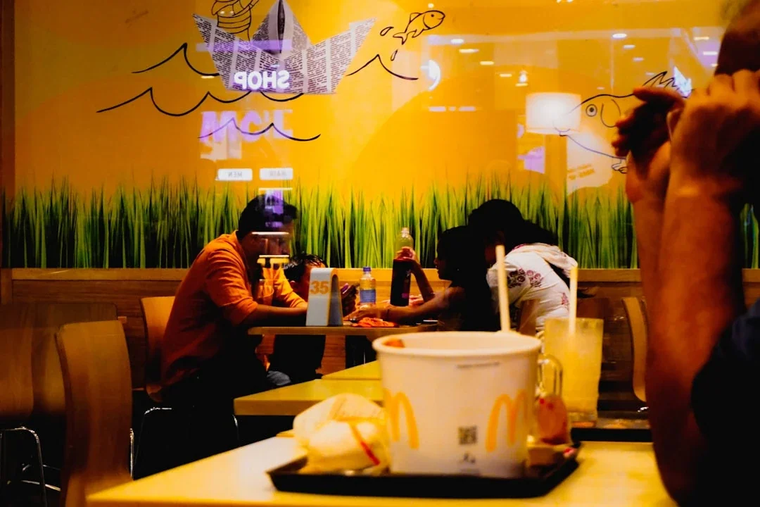 People eating at a fast food restaurant.