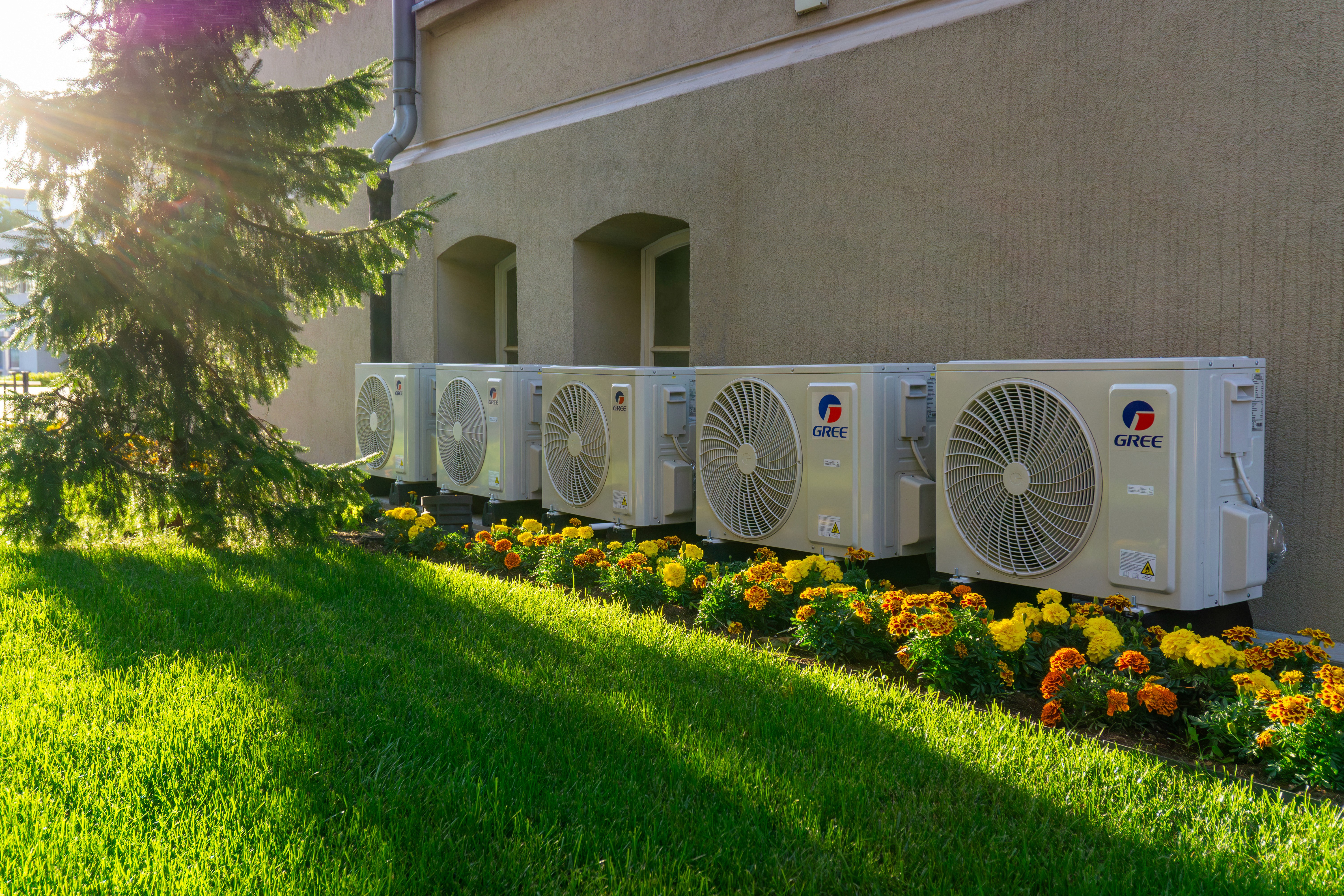 HVAC ductwork and ventilation systems against an industrial ceiling