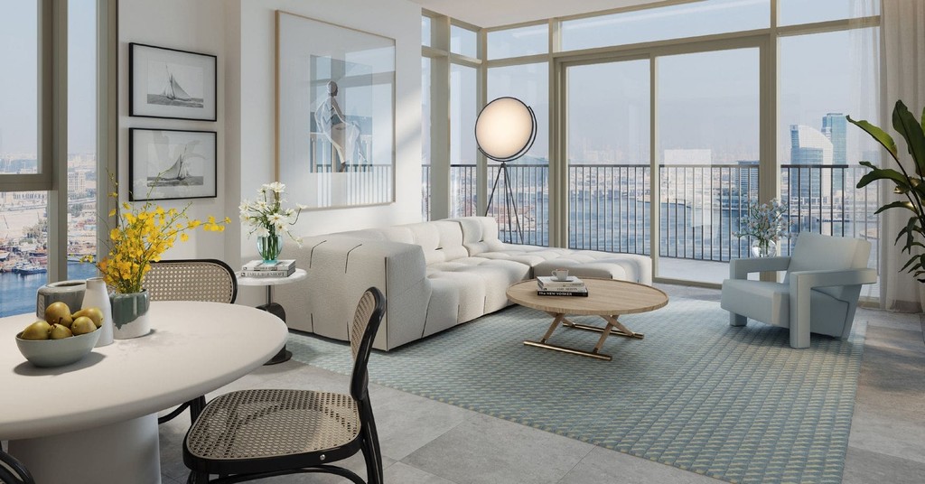 A cozy bedroom featuring a large window with a stunning view of the city skyline from Creek Crescent.