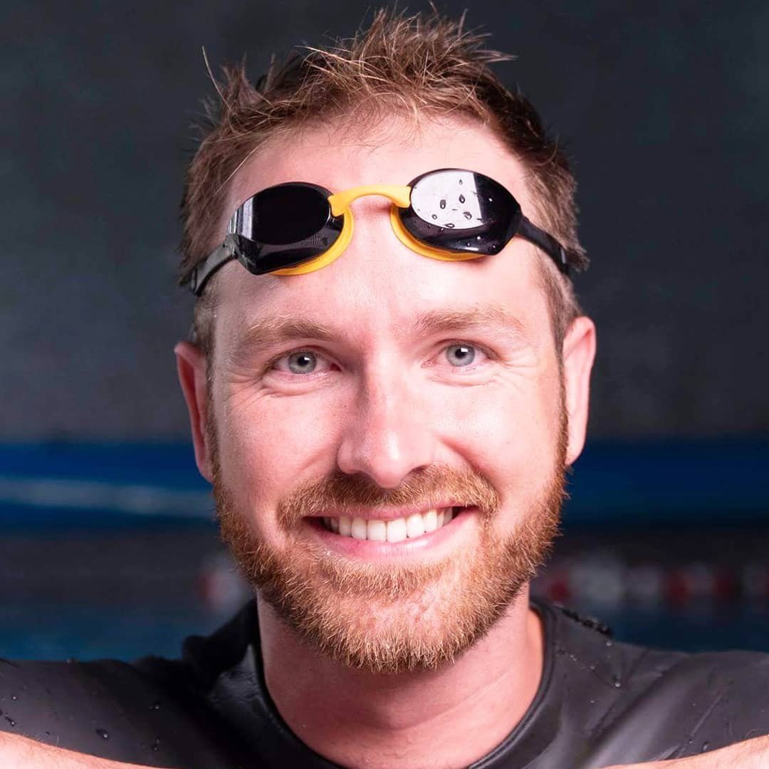 meister woman athlete holding fins photo