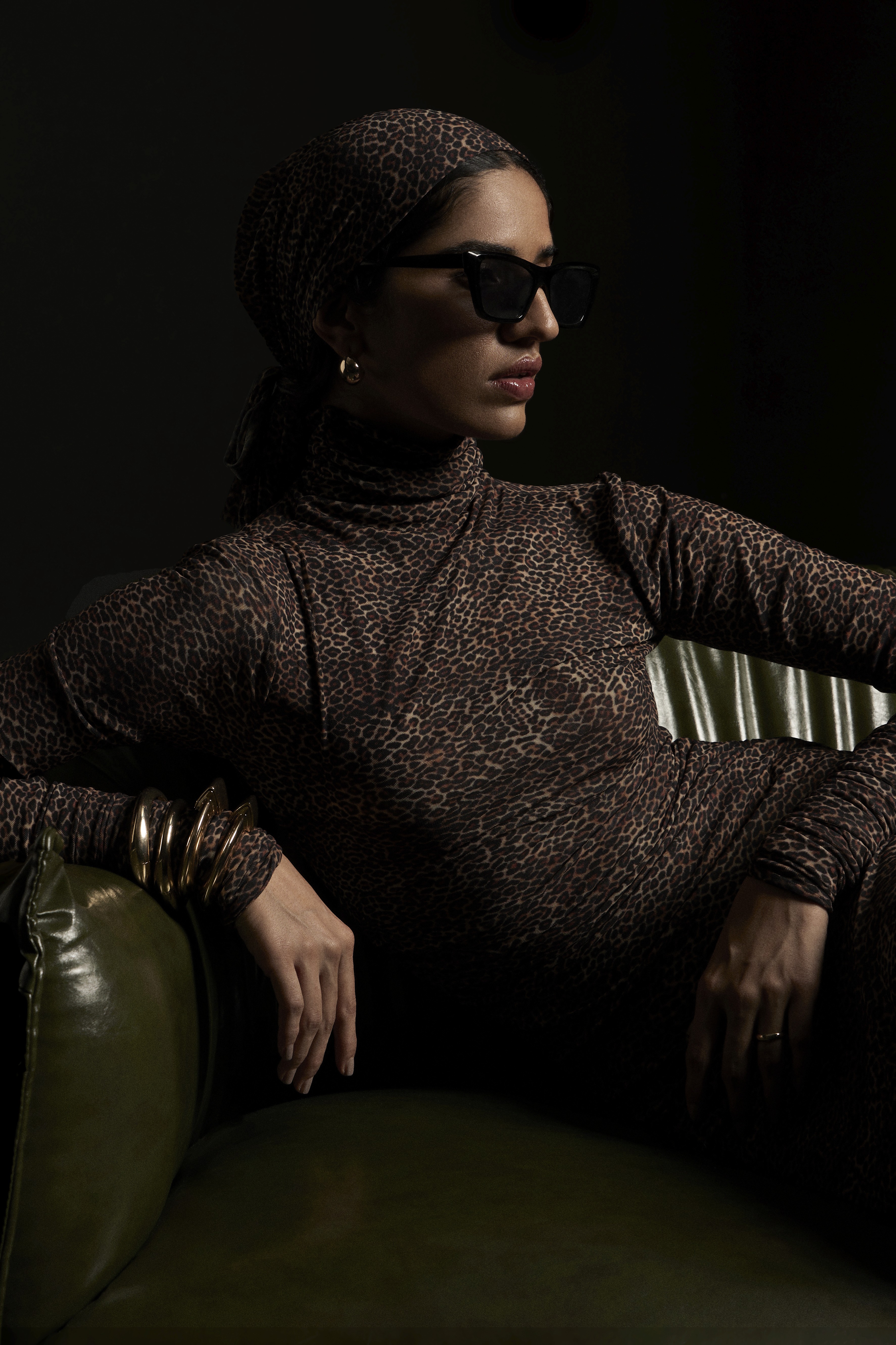 Friends laughing and posing inside a car