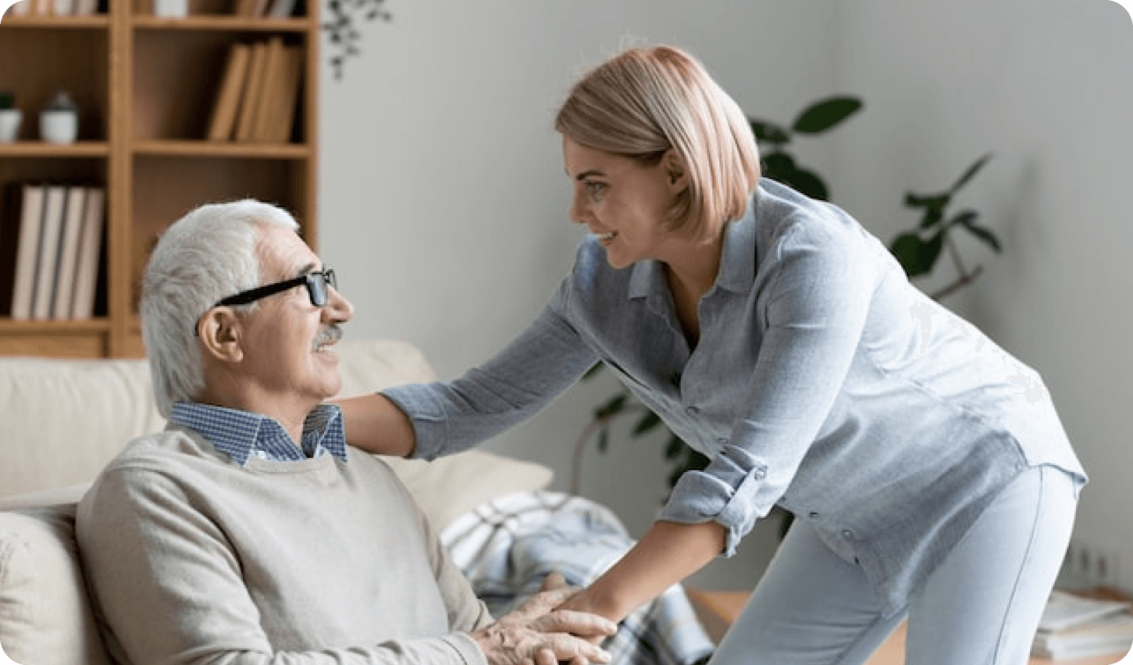mature-casual-man-couch-holding-hand-his-daughter-while-looking-her-chat-home