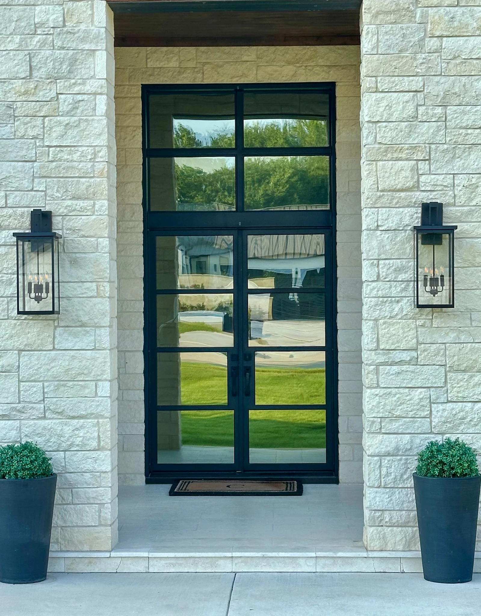 Traditional wrought iron double doors by M2 Metals Iron Doors DFW