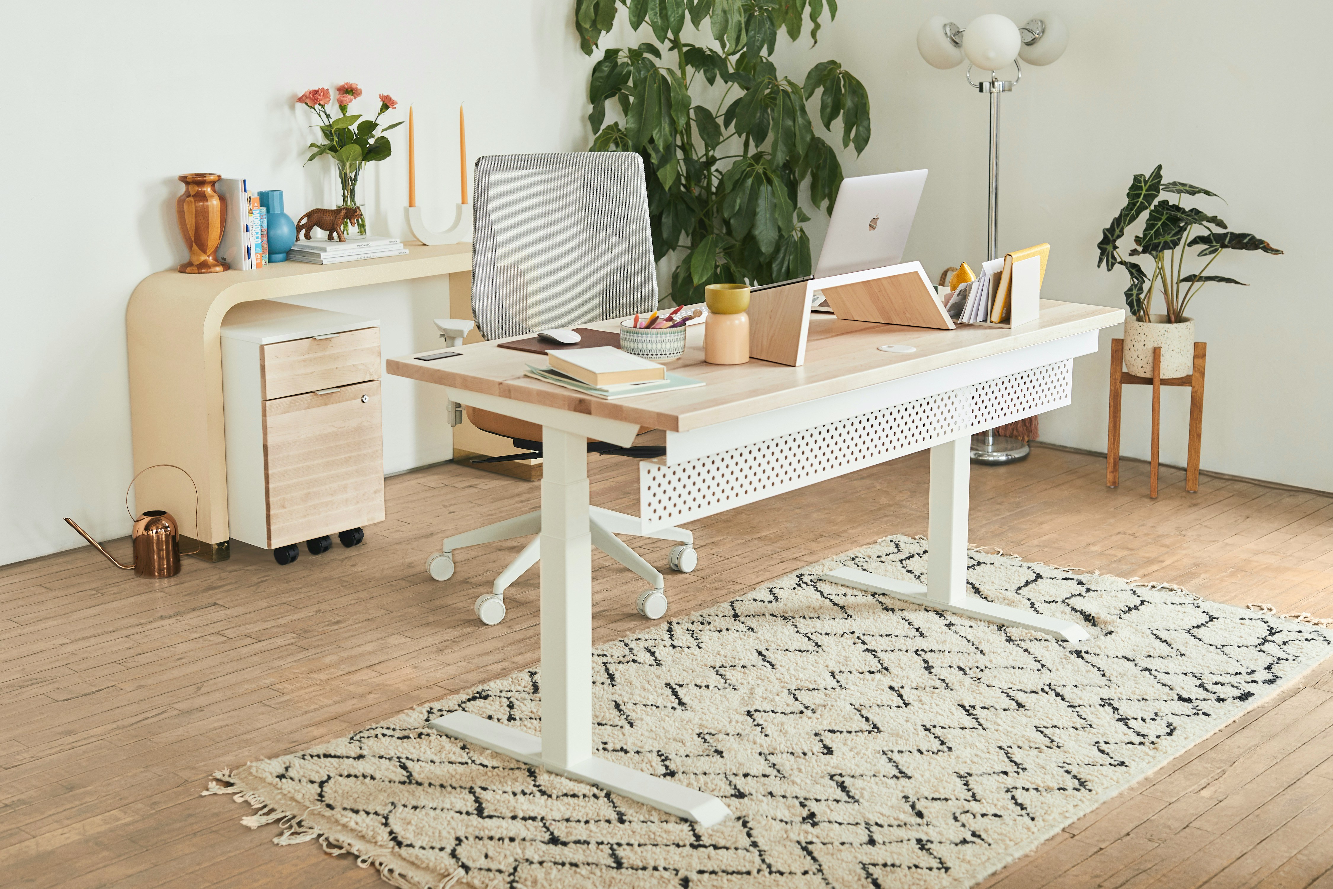 A clean home office in beigy subtle colours