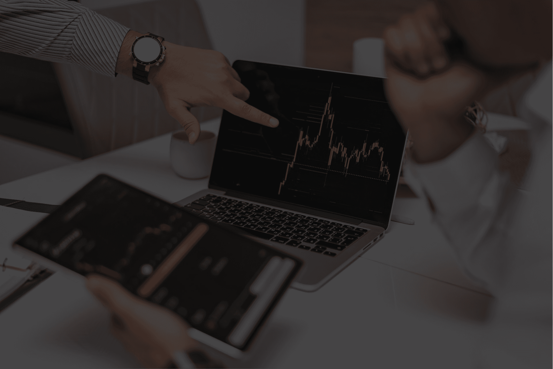 Data analytics and AI strategy consulting team reviewing business intelligence dashboards, analytics reports, and AI-driven insights in a modern office environment.