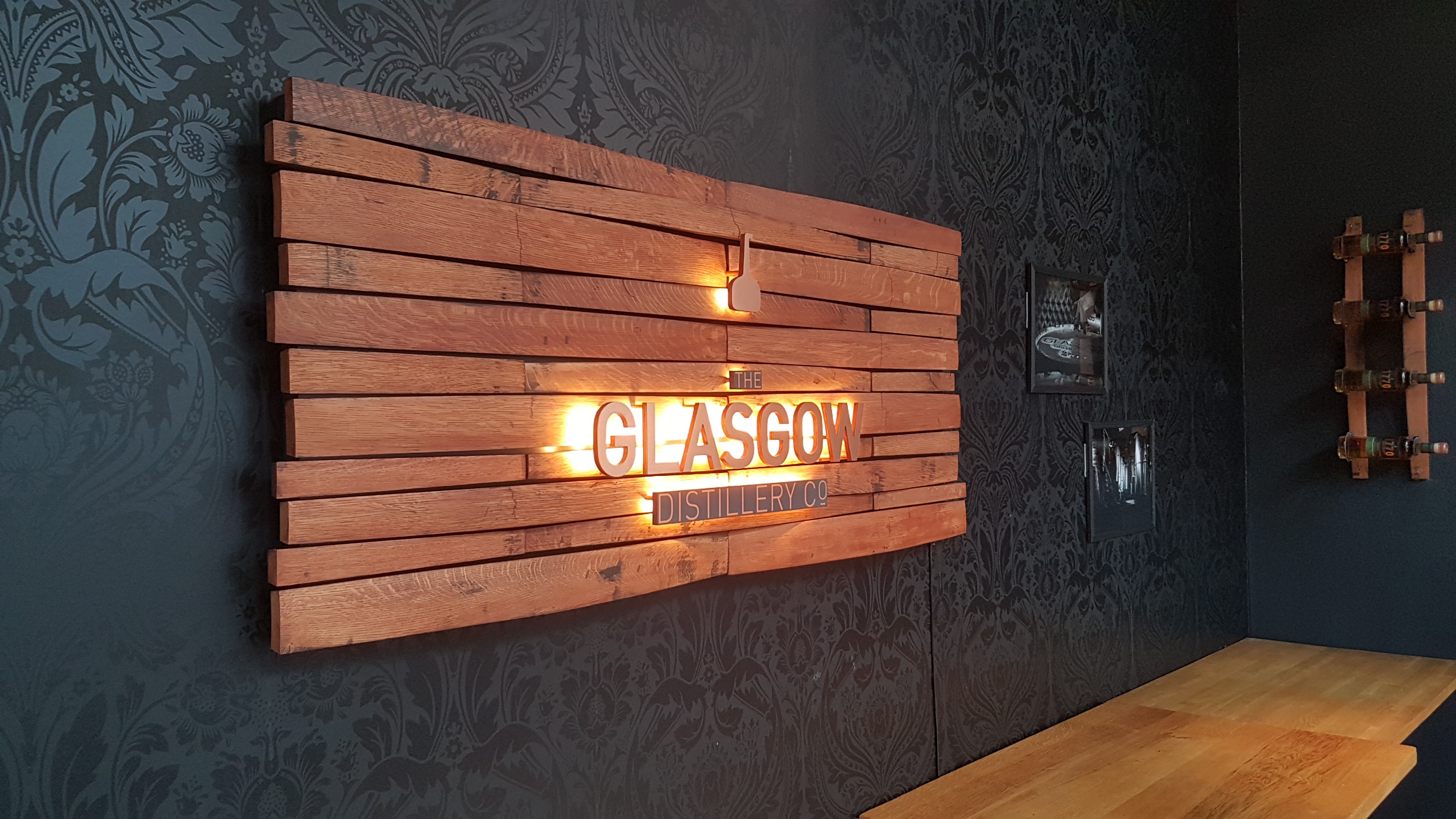 Branded whisky bar signage retail & interior design