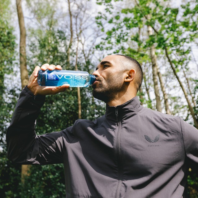 a pair of yellow and white tubes sitting on top of each other