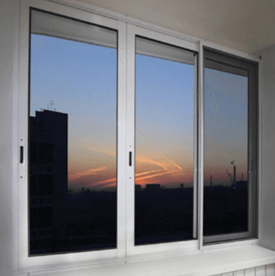 uPVC sliding window with 3-track system installed on a balcony by Skillstech Coimbatore
