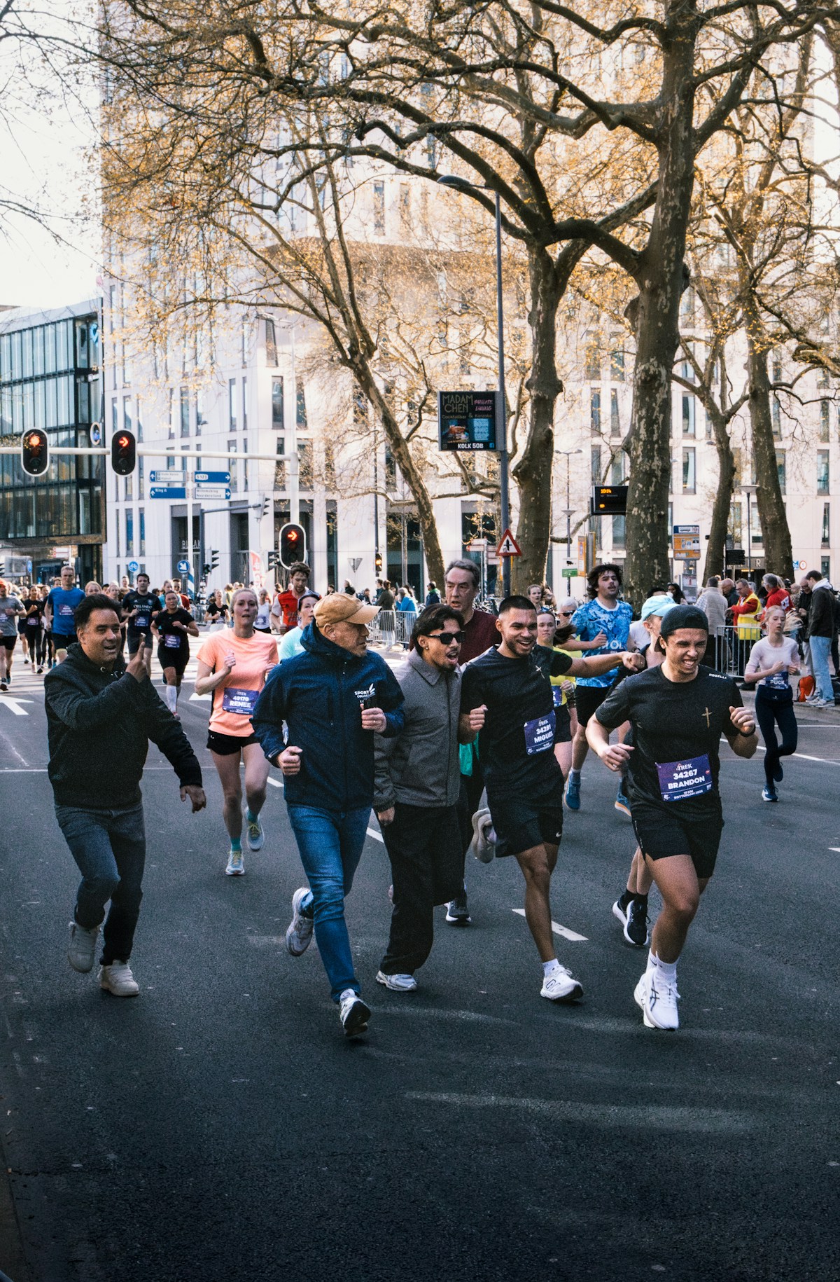 Firstlight Run Club members running together through the city