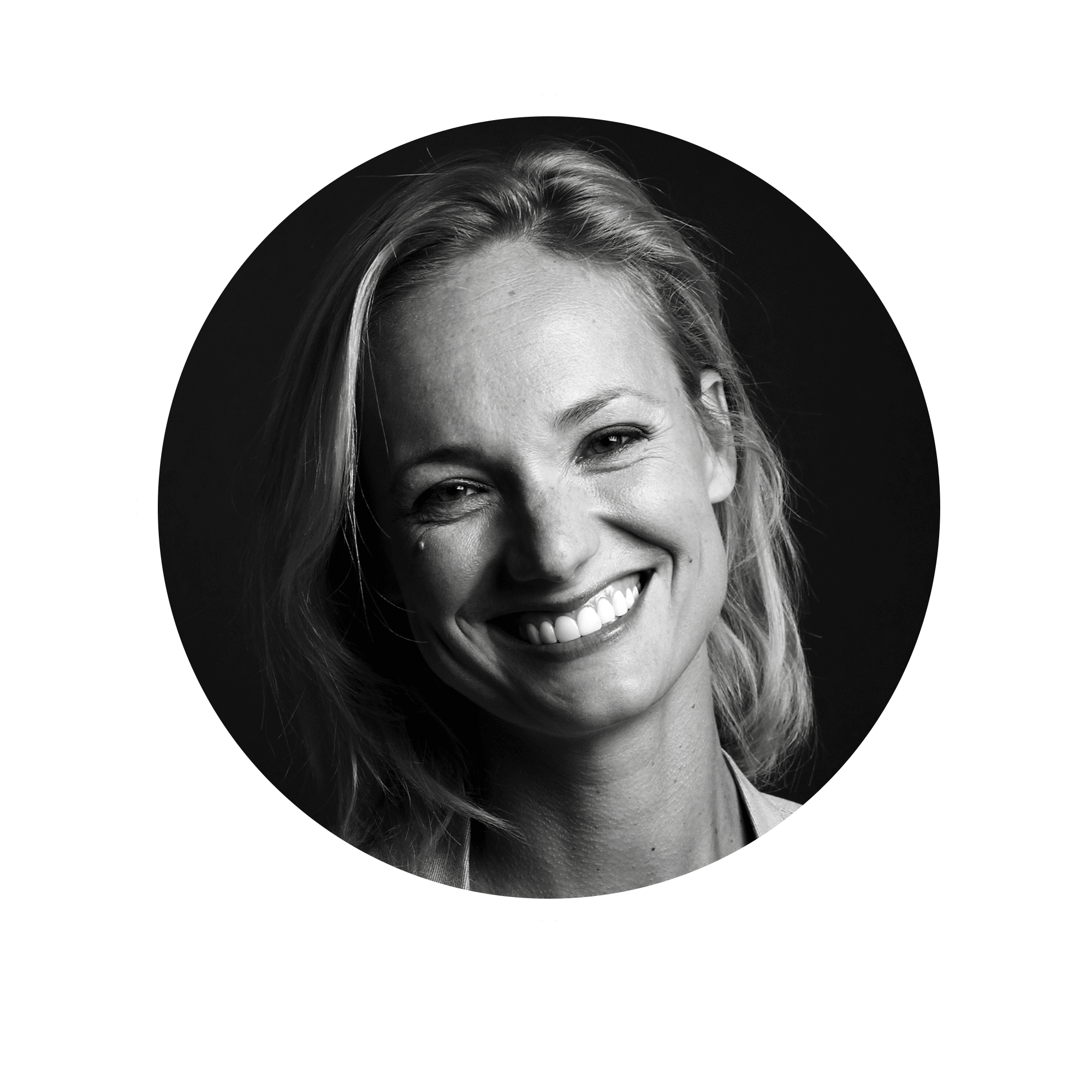 Portrait of medium brown and white dog on pink background