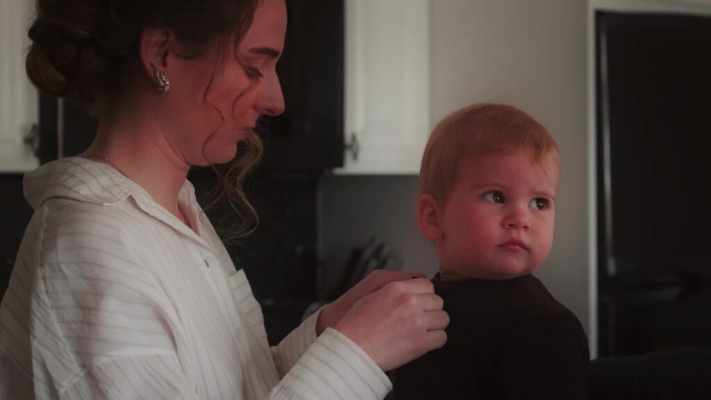 Bride getting ready with her young son at Snowmass home before Pine Creek Cookhouse winter wedding