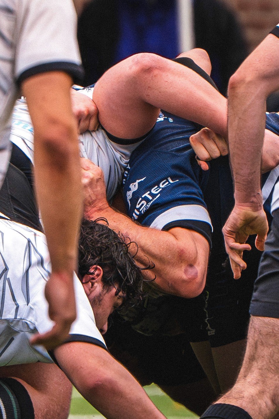 Elf woman in white dress raising hands by the river
