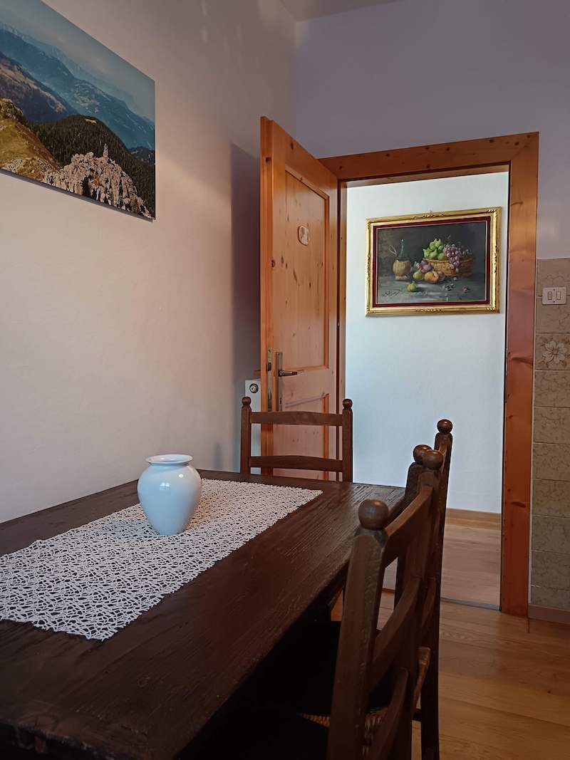 Kitchen of the apartment with a table for up to four people