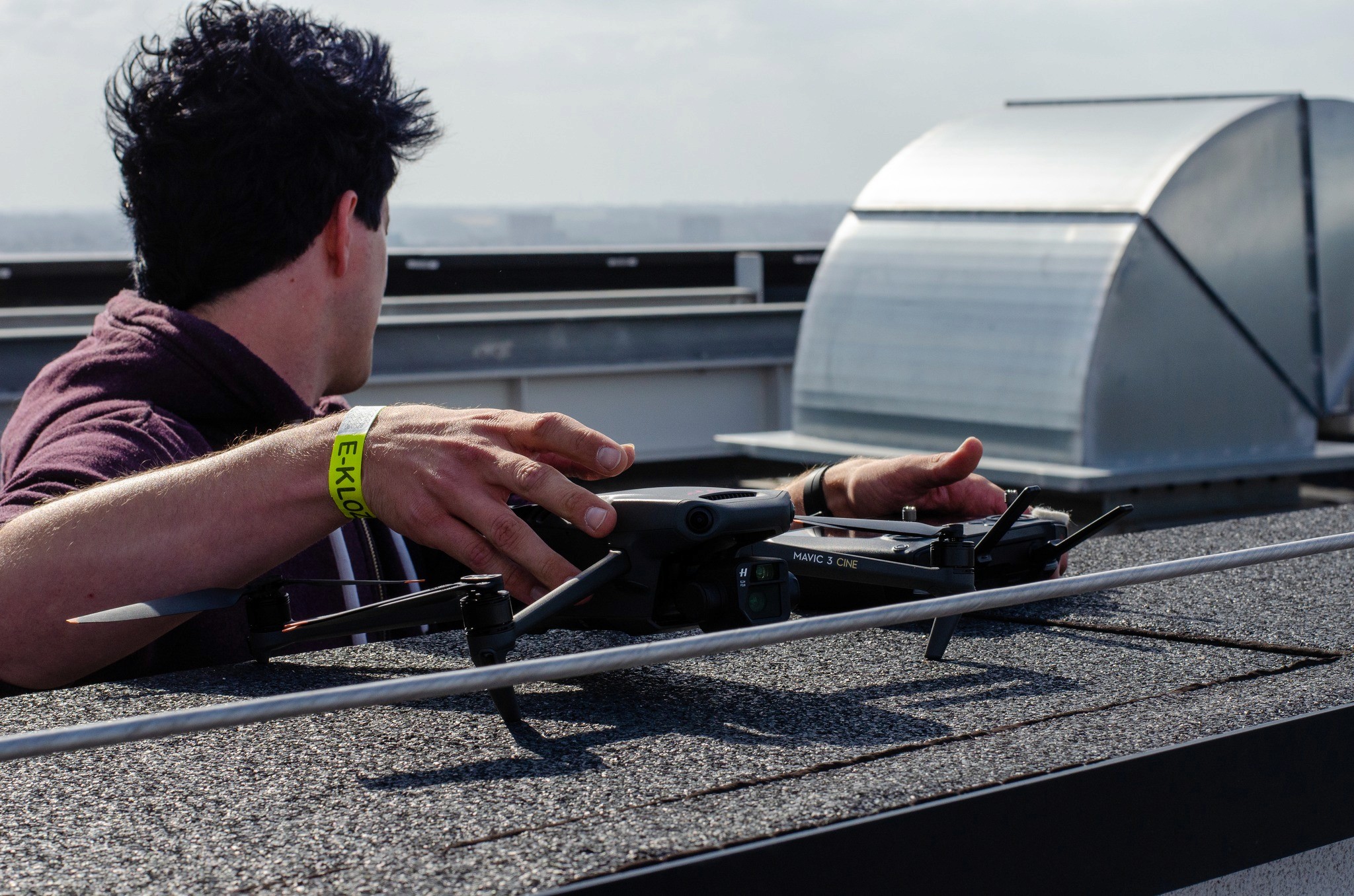 Drone pilot getting his drone ready to fly