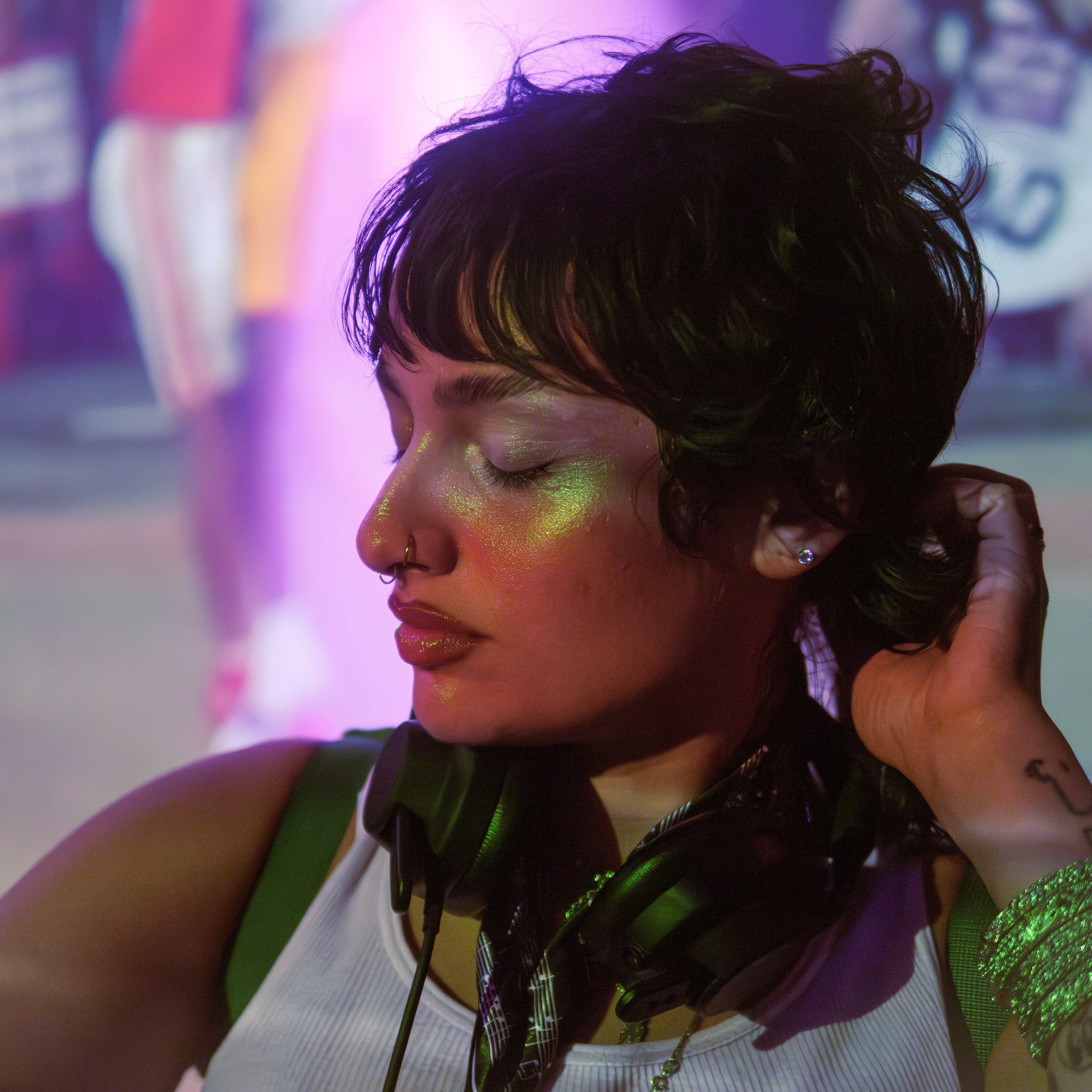 a woman holding a red flower