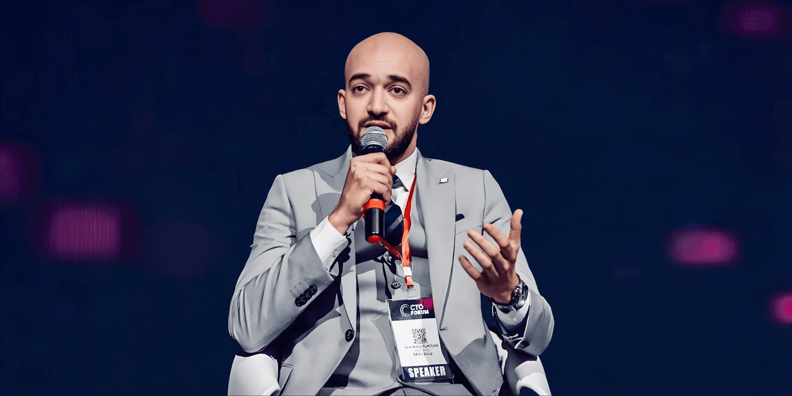 Taher Amine ELHOUARI speaking at a cybersecurity event, emphasizing leadership, operational resilience, and the real-world impact of cybersecurity.