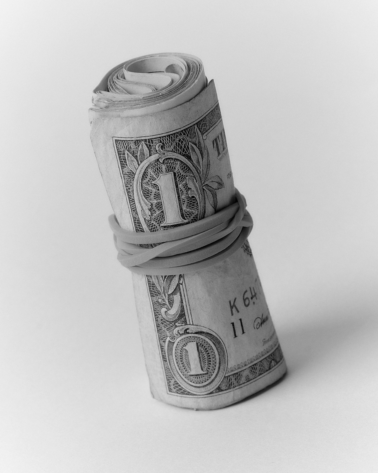 Bills rolled in a rubber band