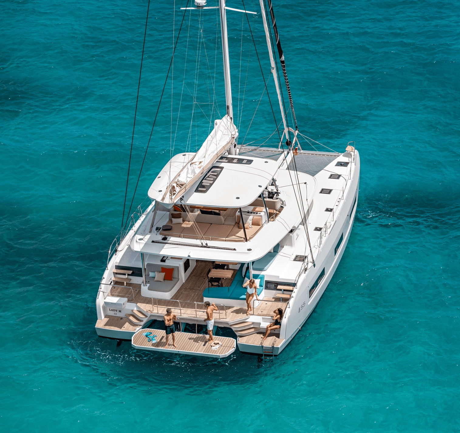 white and blue boat on sea during daytime