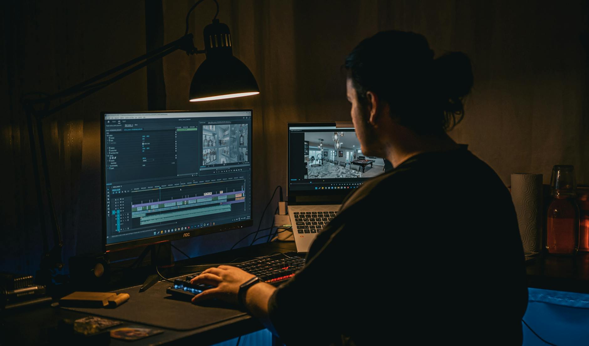 High school student editing football highlights on computer screen
