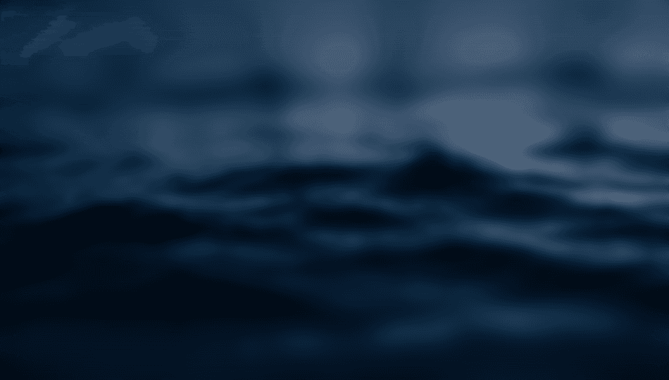 Macro photography of dark indigo fabric or deep blue ocean water at night