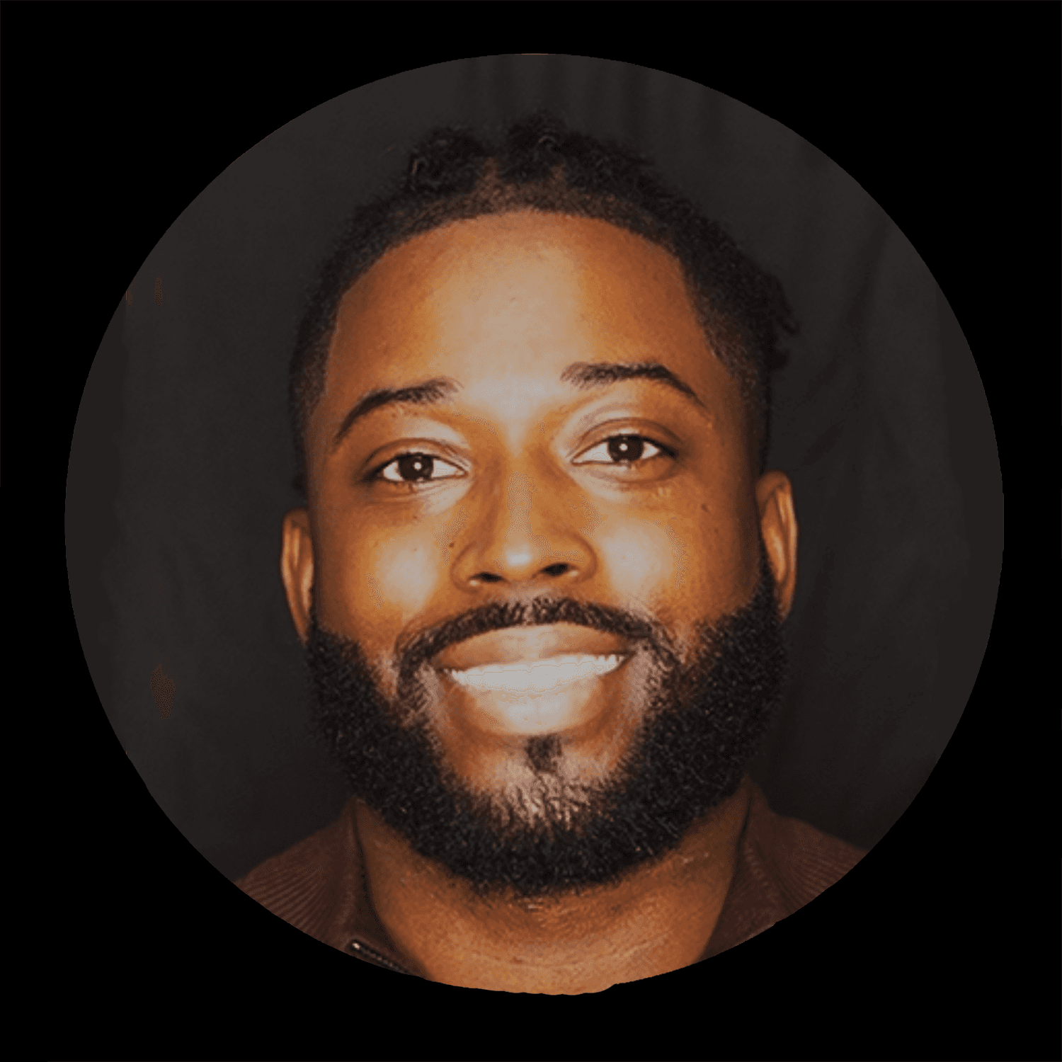woman in black crew neck t-shirt wearing brown framed eyeglasses standing on rocky shore during