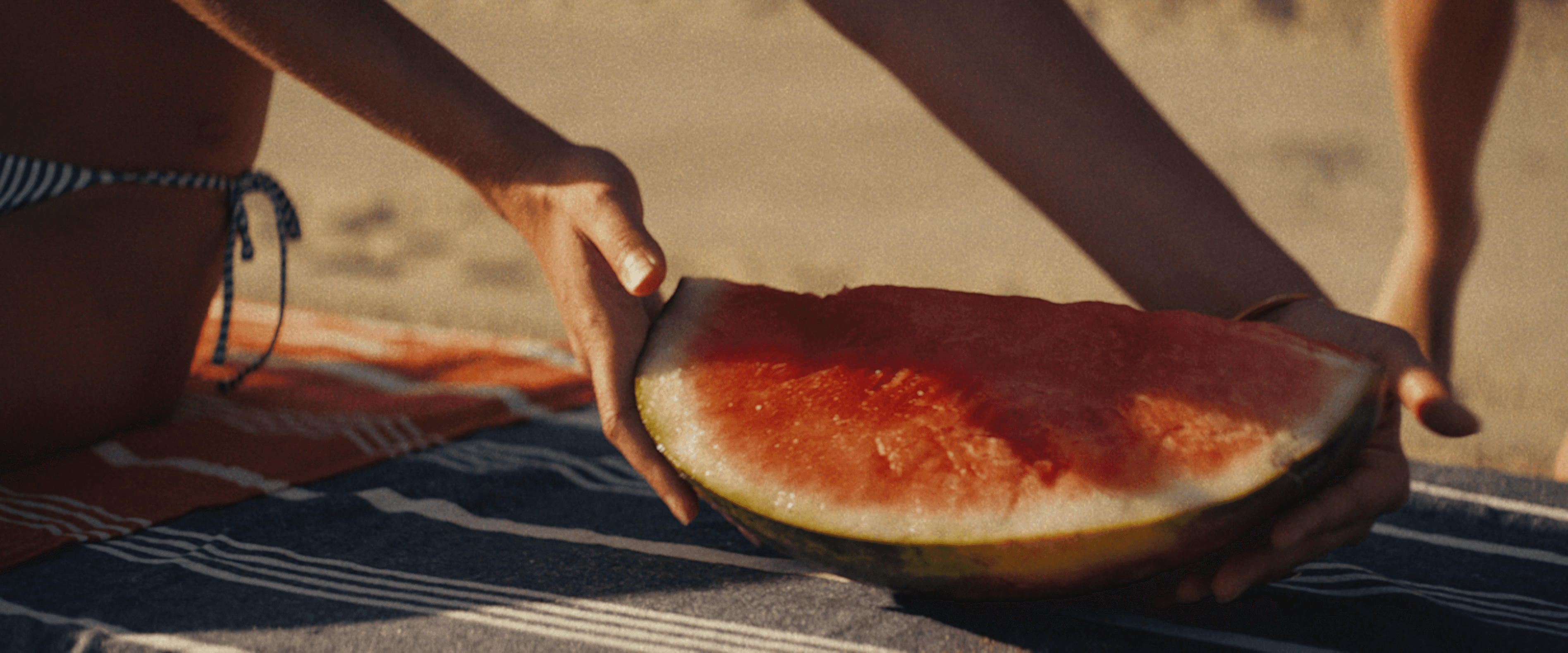 Busy city street at night with glowing billboards