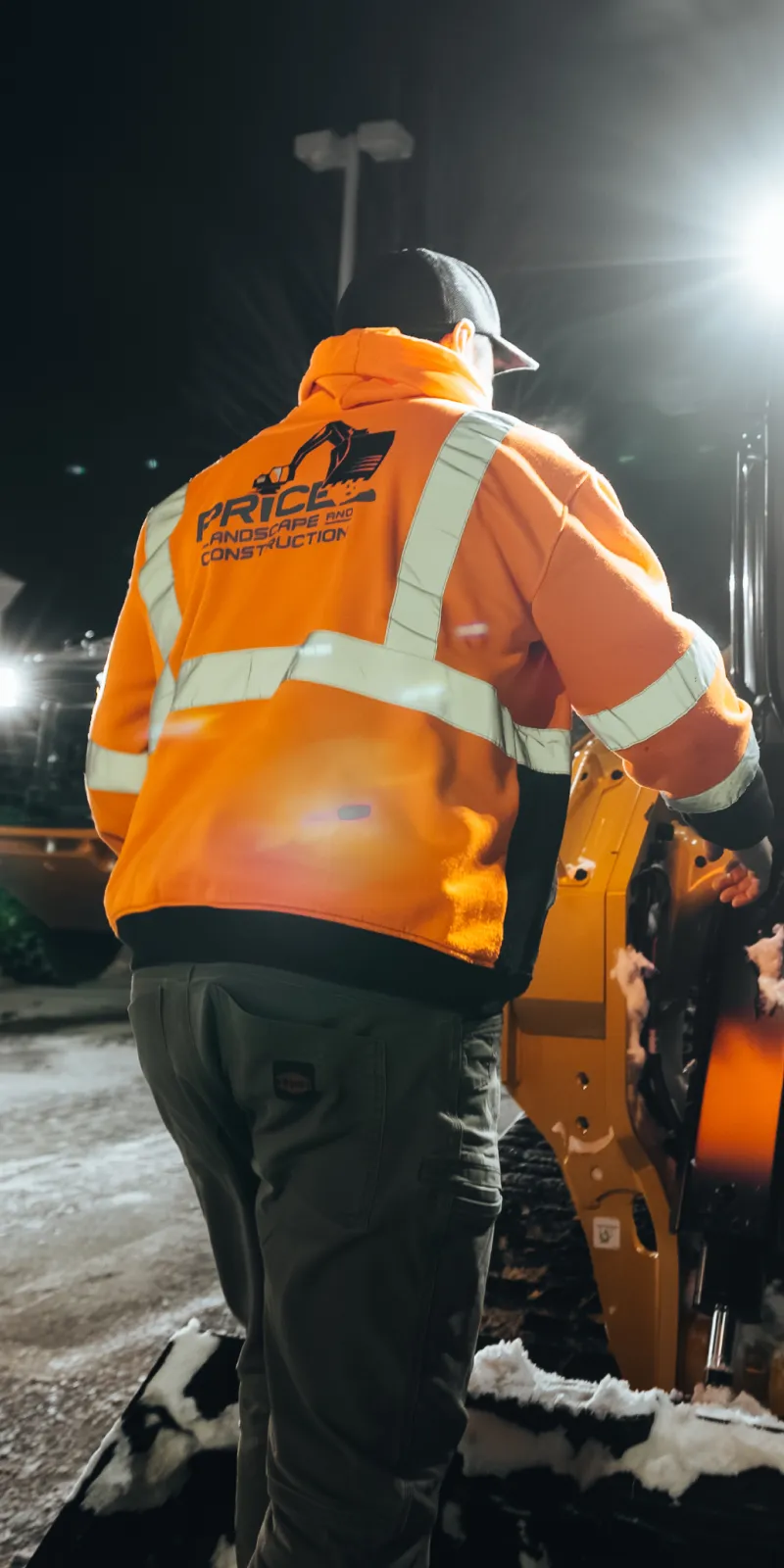 Price Landscape and Construction doing snow removal