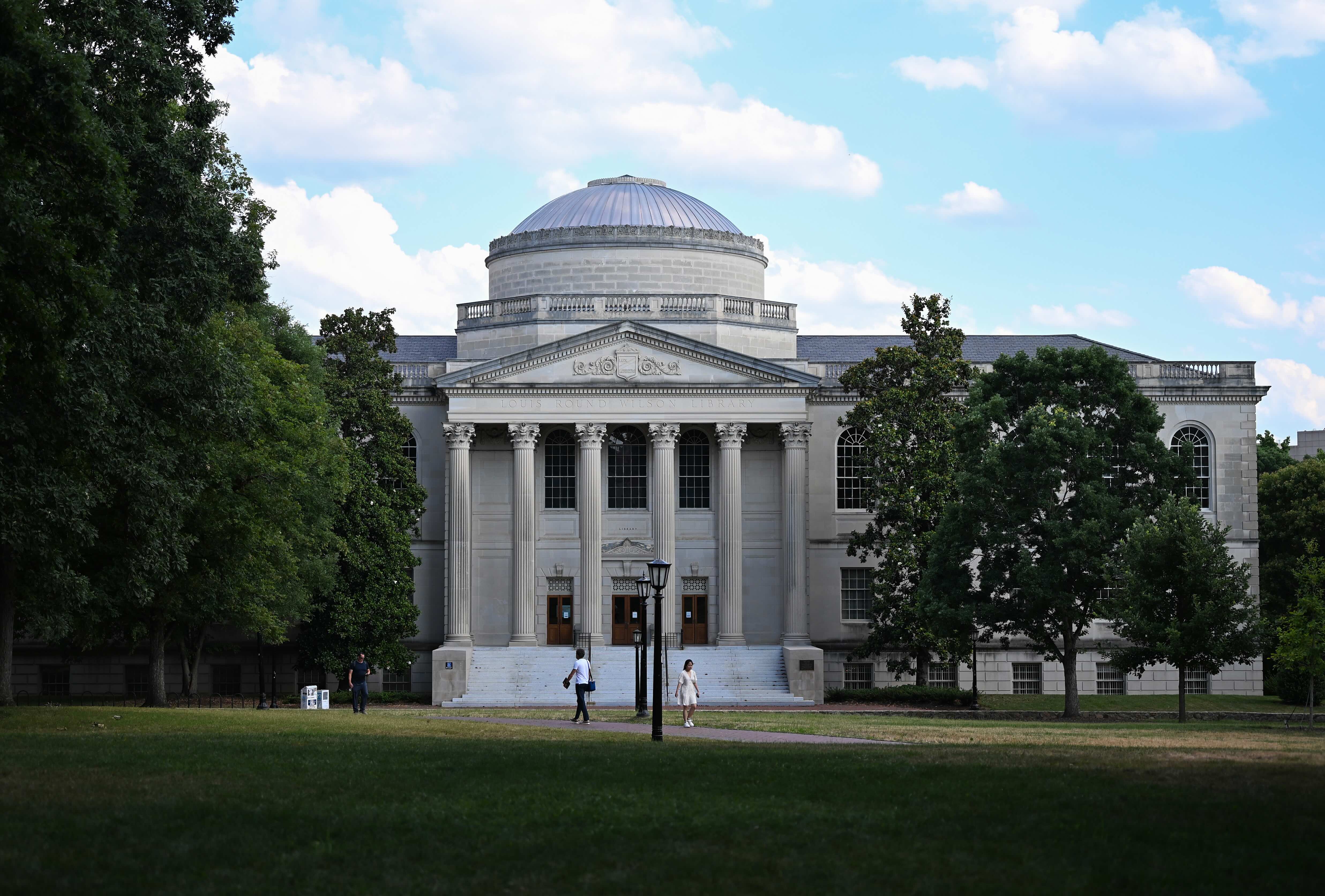 Louis Round Wilson Library at UNC Chapel Hill seen across the lawn on a summer afternoon