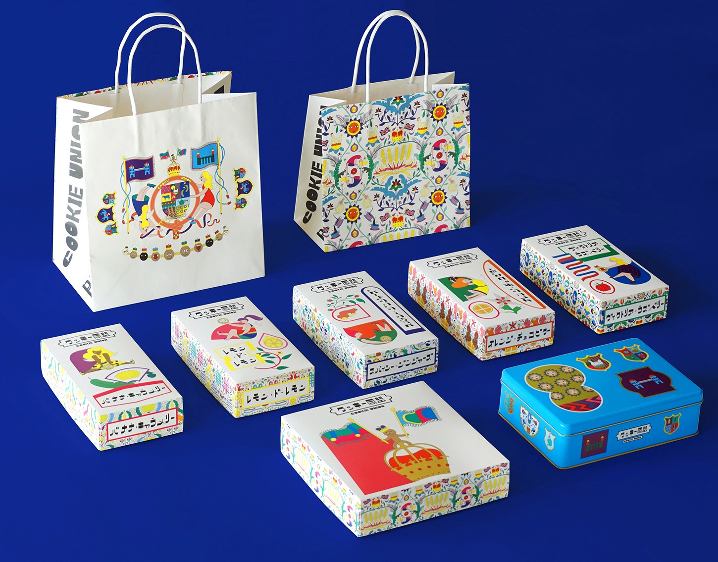Full Cookie Union packaging lineup showing multiple illustrated boxes and shopping bags.