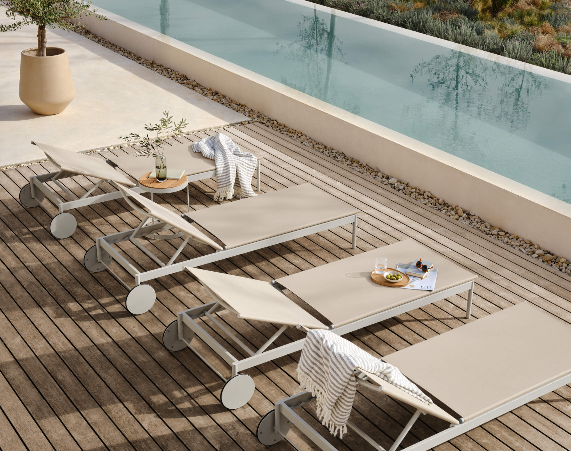 Woman by the sea with waves splashing