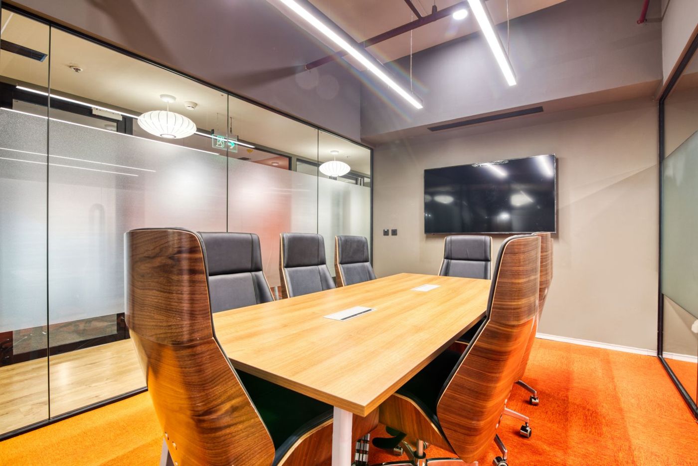 Conference room with a wooden table and chairs