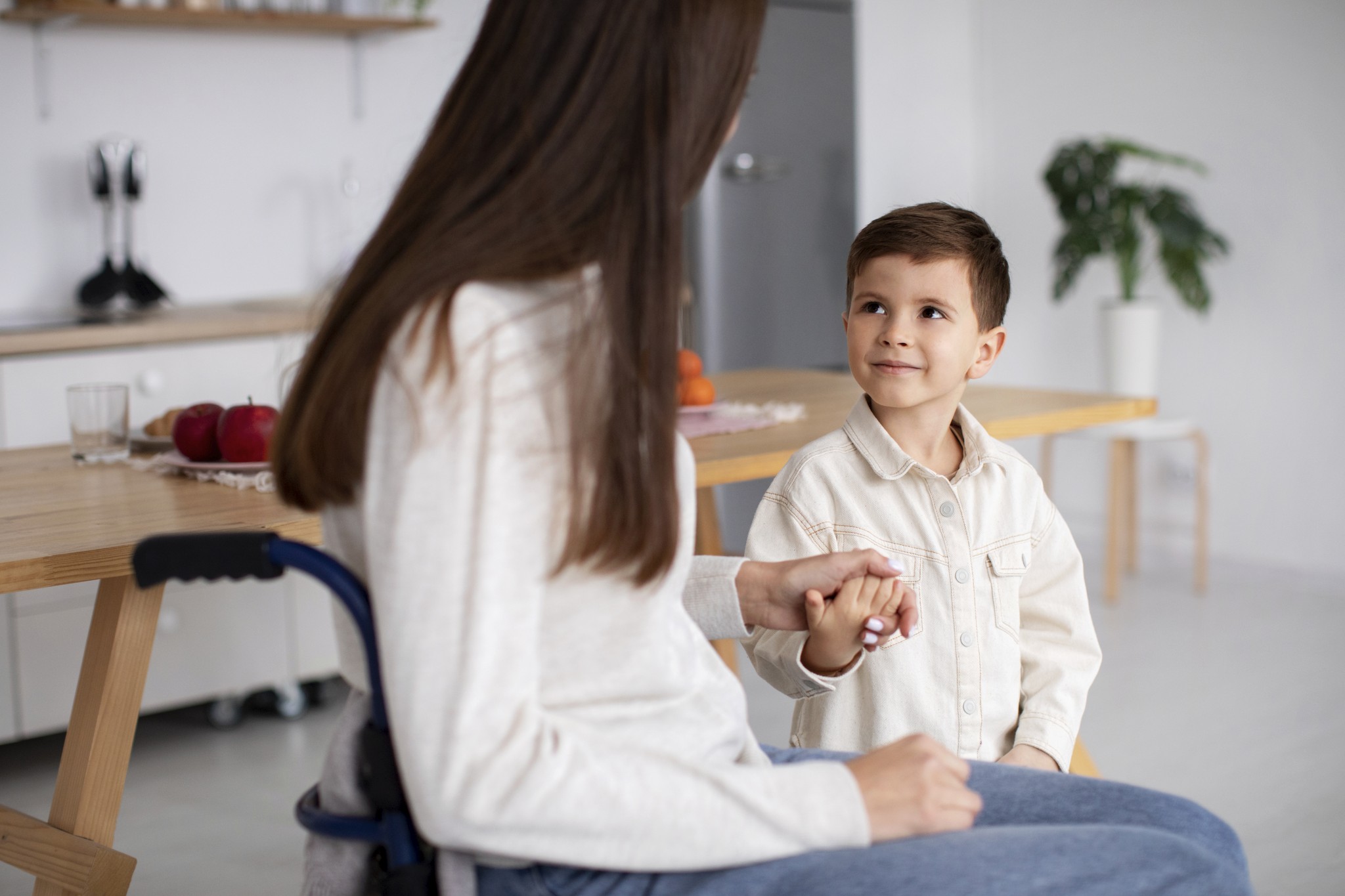 Child therapist interacting with a young patient, representing how CompliantChatGPT helps family and children therapists connect symptoms, draft structured treatment plans, and spend more time on therapy instead of paperwork.