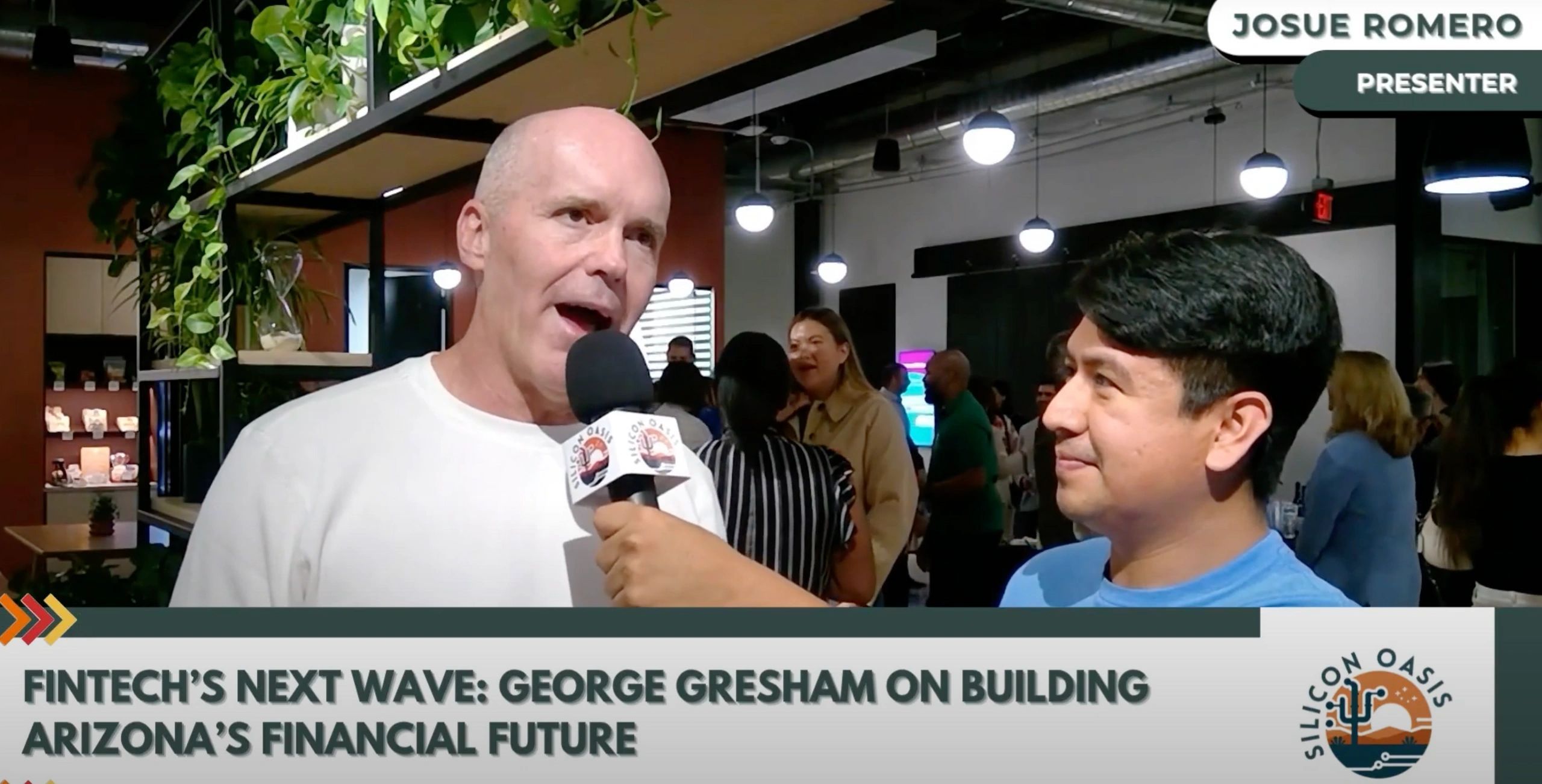 a black and white living room with a large tv