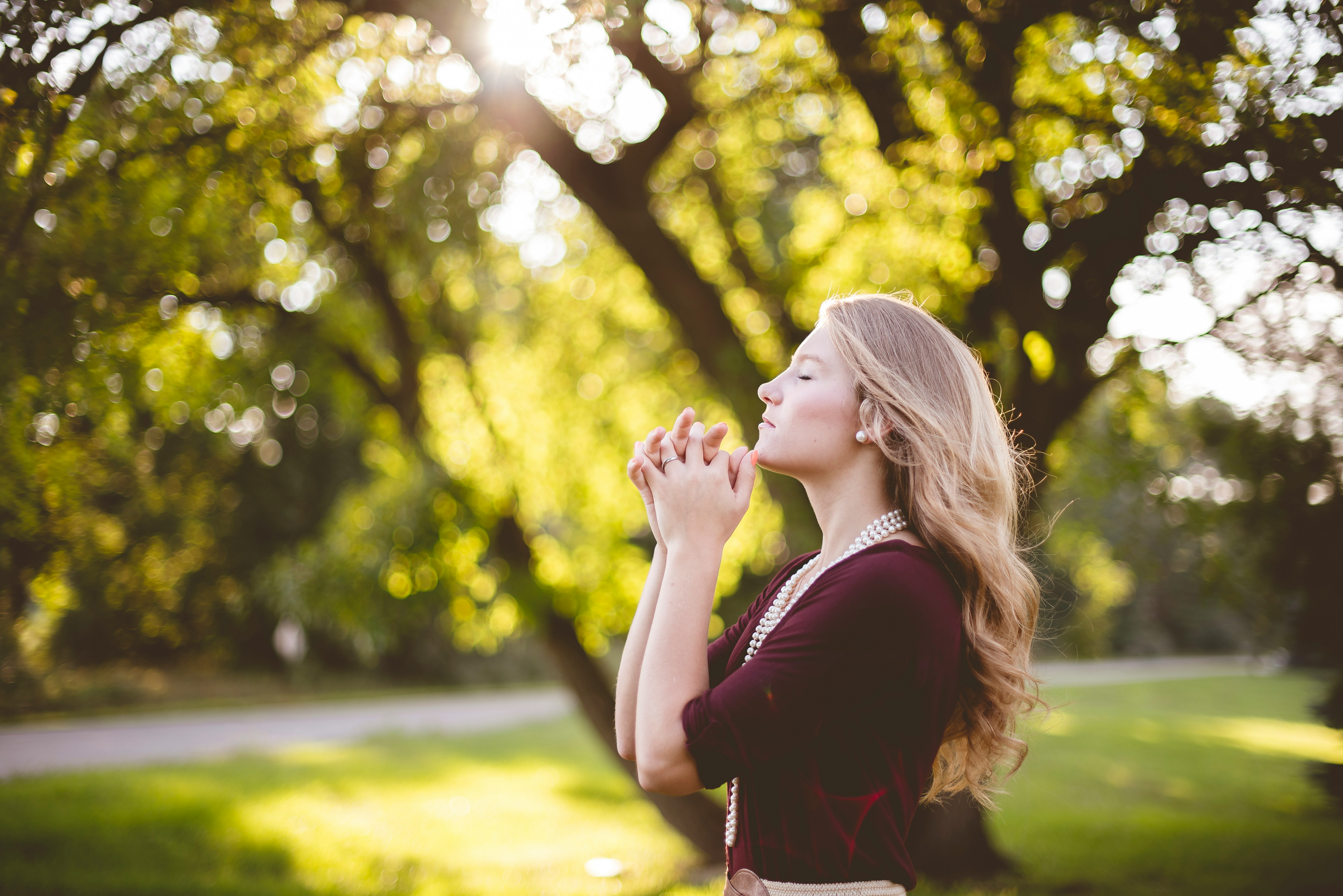 woman praying for glow up - How To Glow Up In A Month