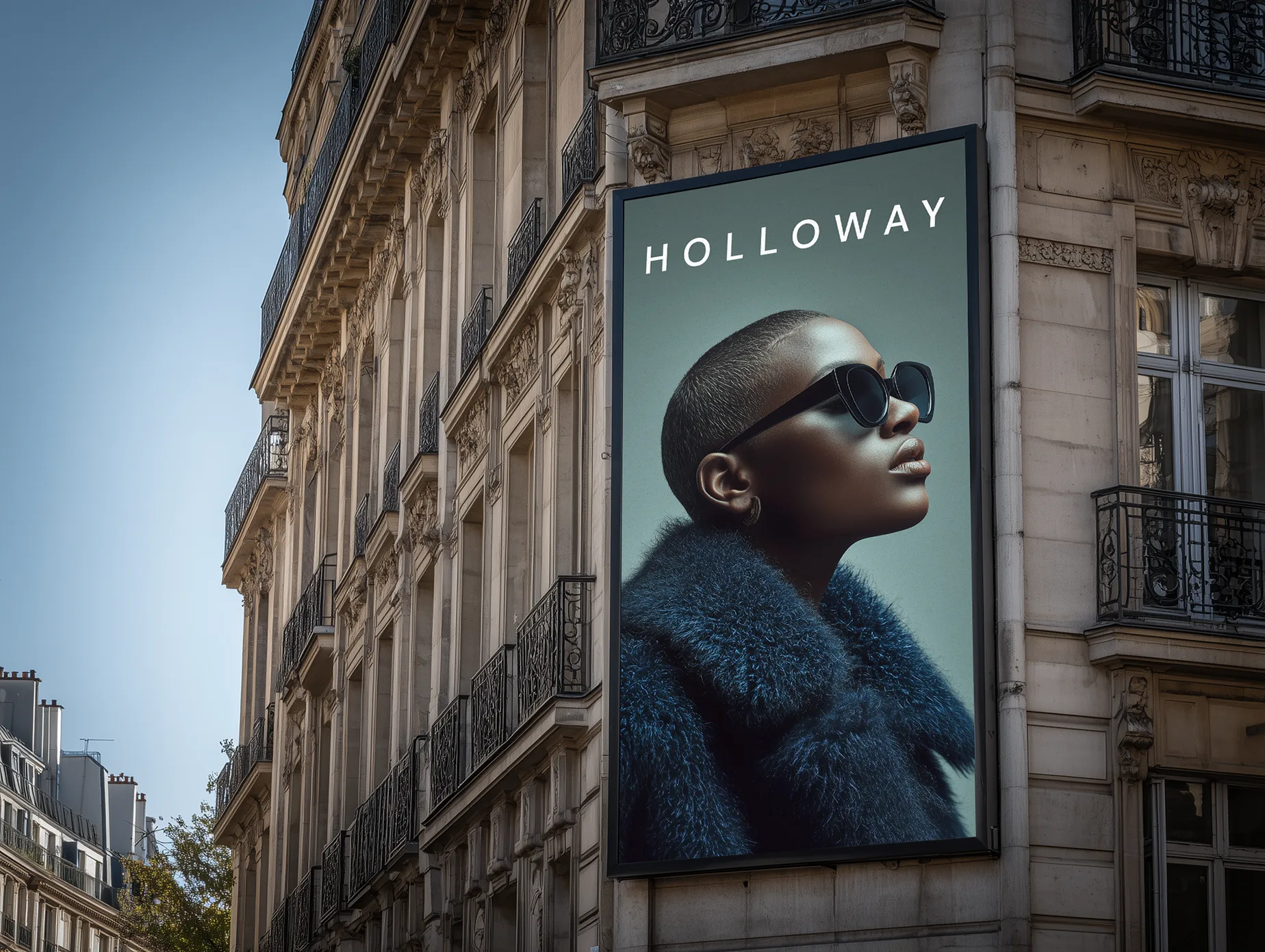 Large-format outdoor poster featuring Holloway fashion campaign displayed on a city building.