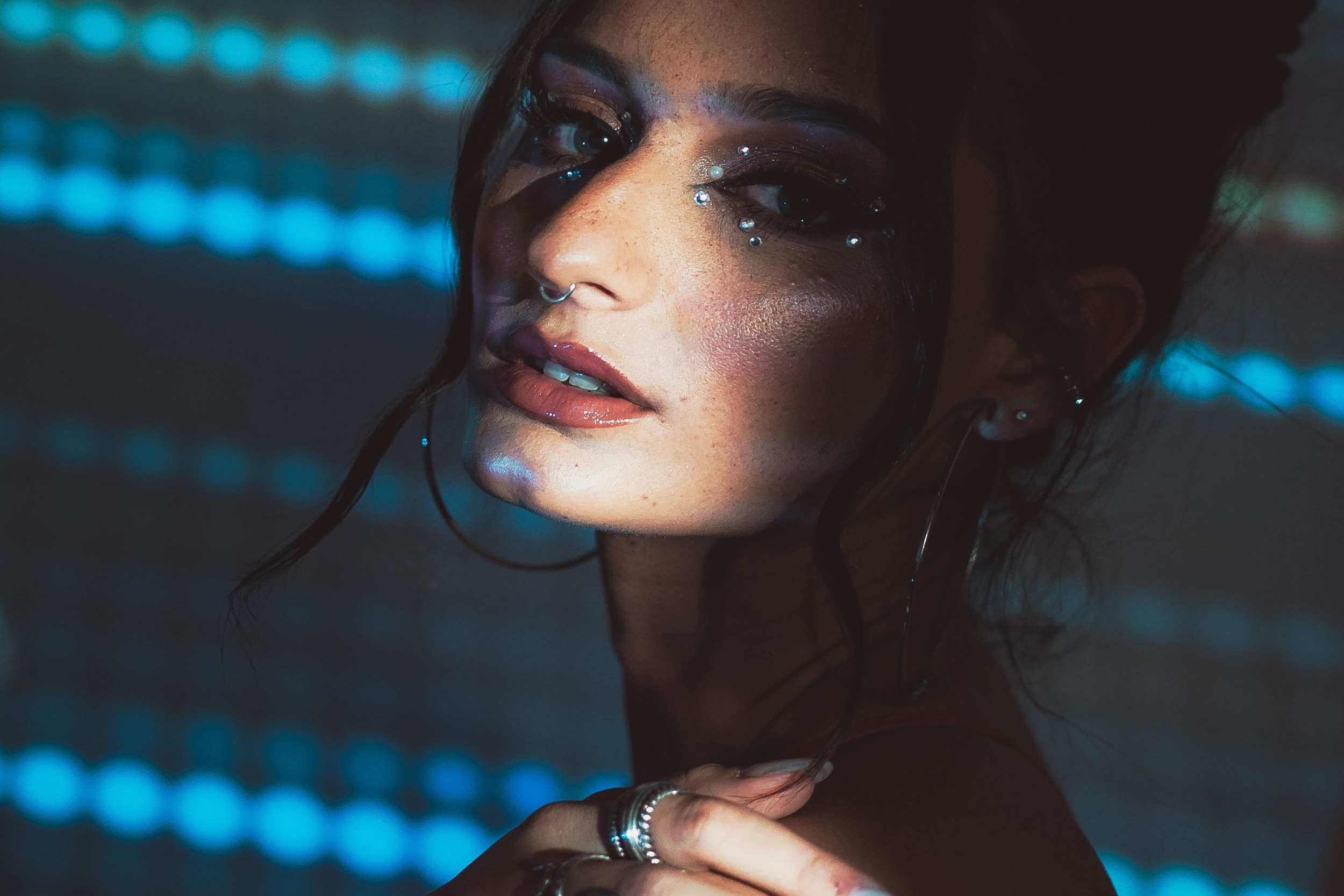 Cinematic portrait photography for Jura music artwork featuring dramatic lighting and contemporary visual aesthetic.