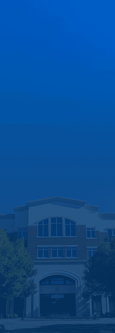 The Gateway Village Main building, next to the best hospitals of the area, with a blue overlay on it