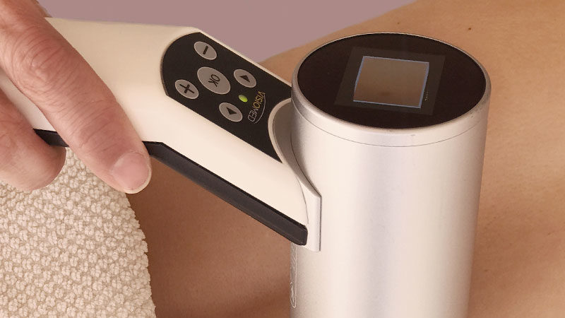 a blurry image of an orange and white background