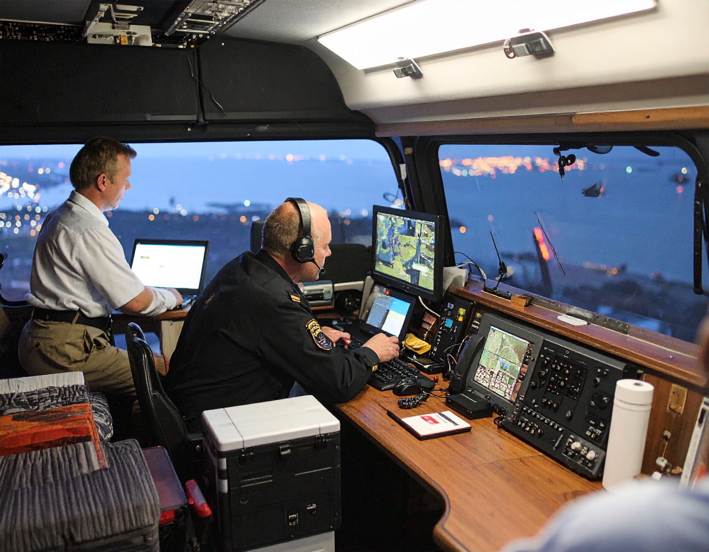 analysts at work in a van
