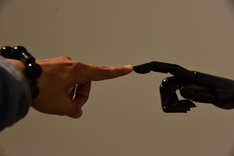 human hands and AI circuitry collaborating to create digital content - Why content is king