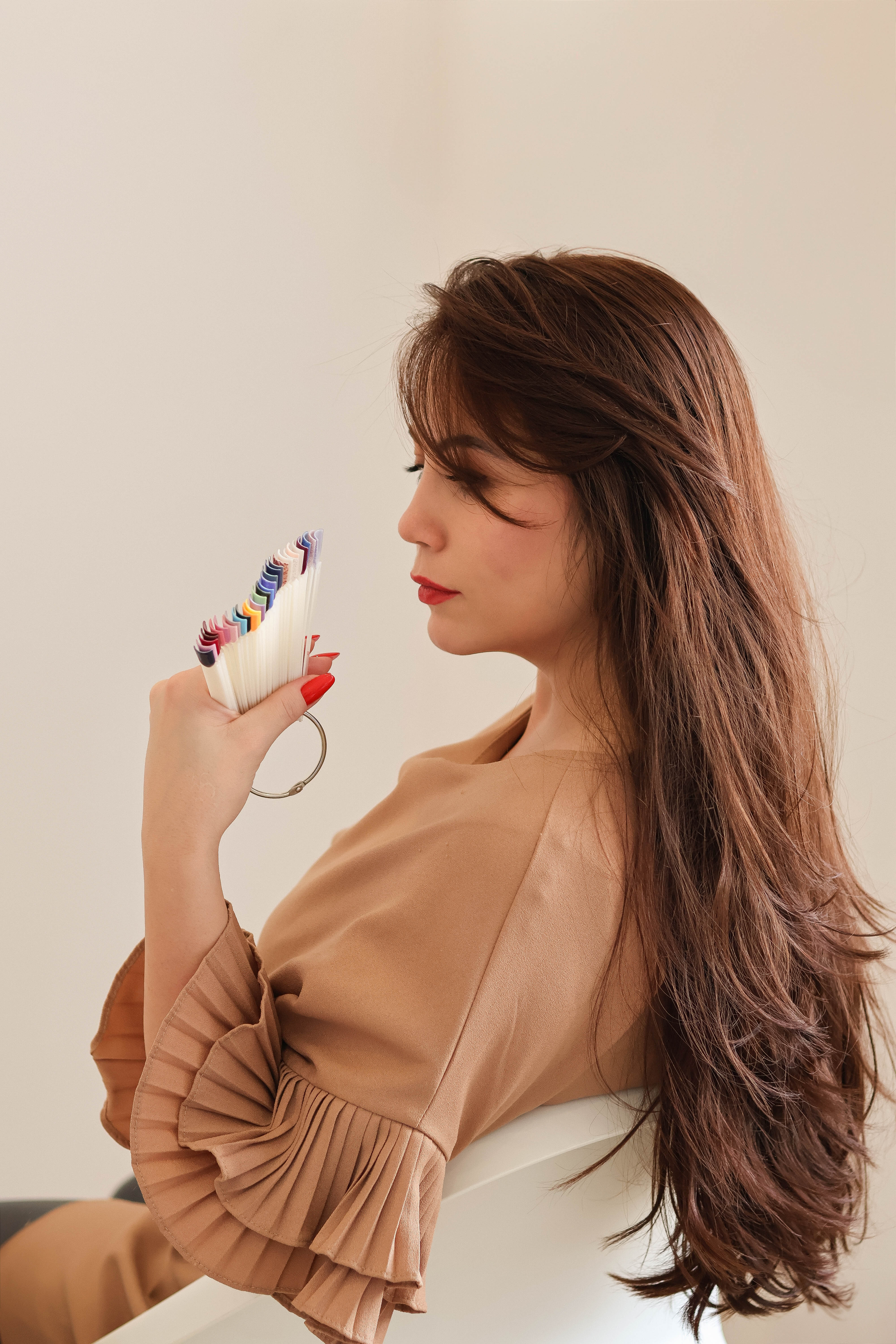 A couple stands closely in an intimate embrace.