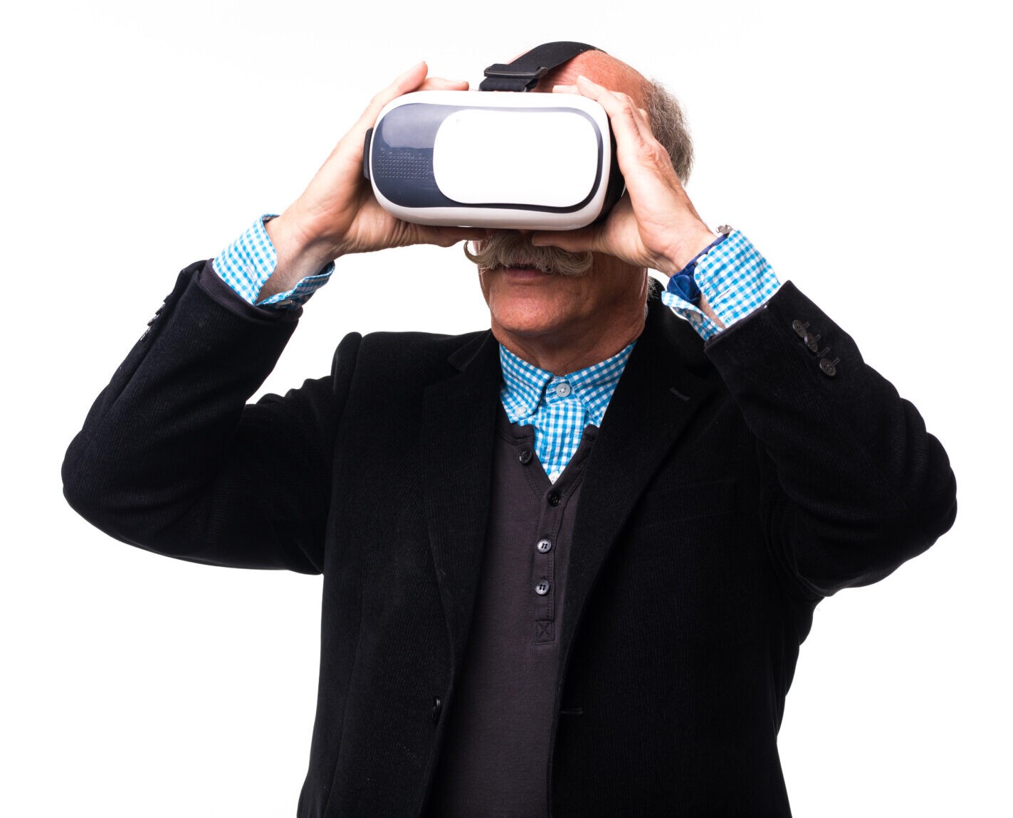 Cheerful senior using a VR headset