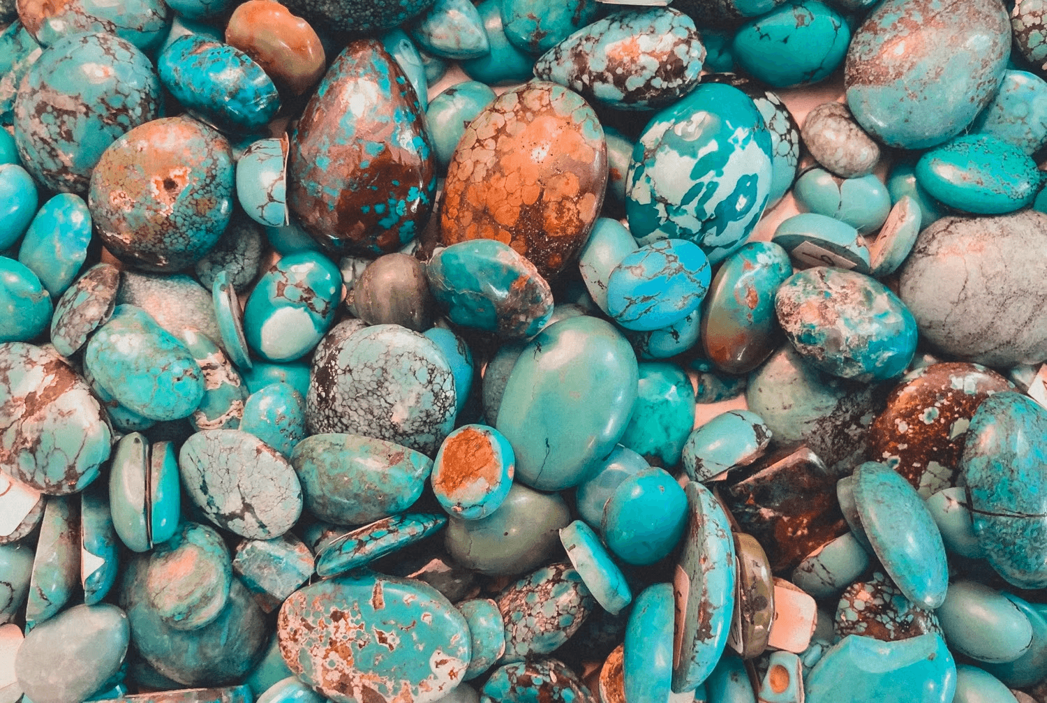 assortment of turquoise gems